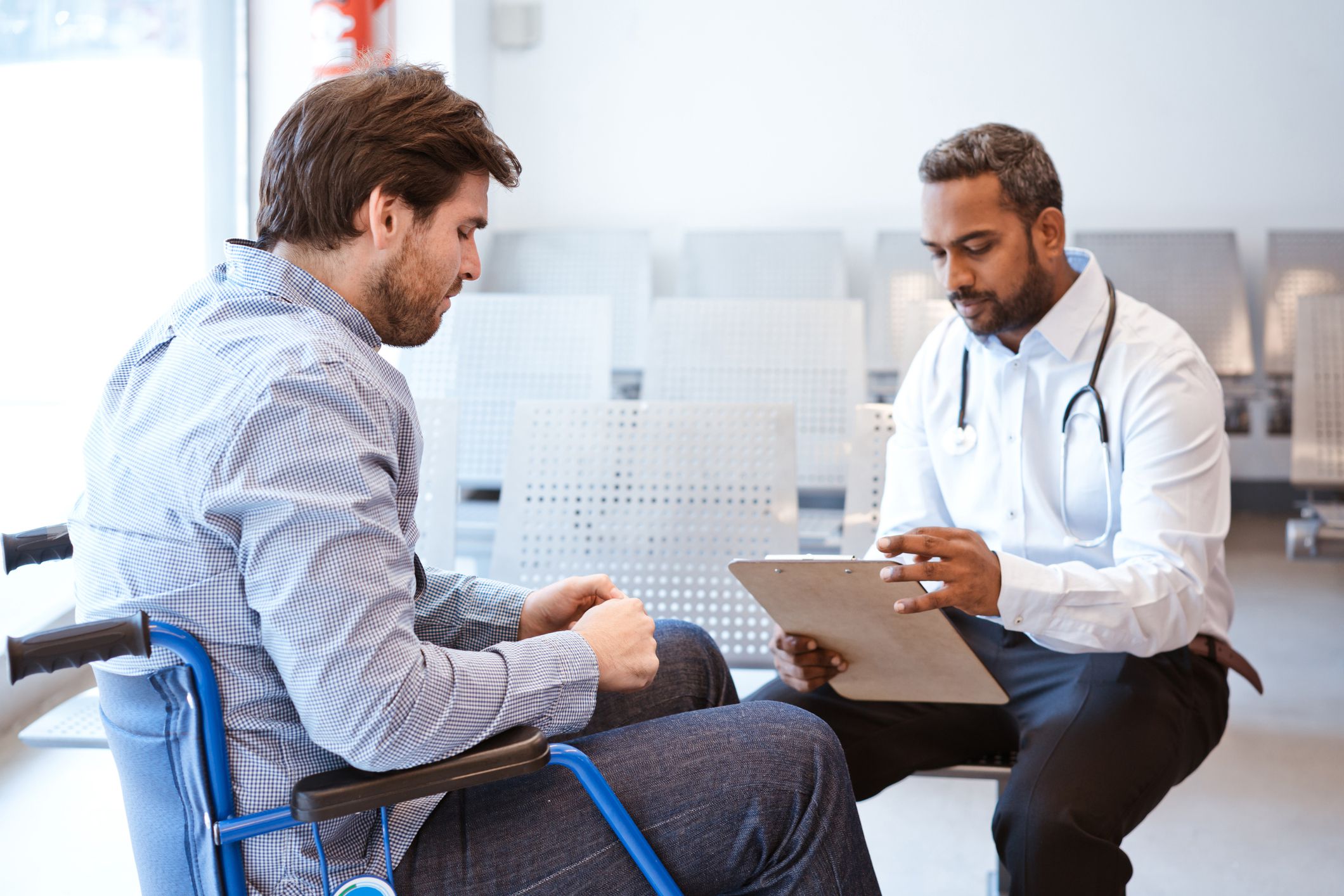 physician speaking to patient