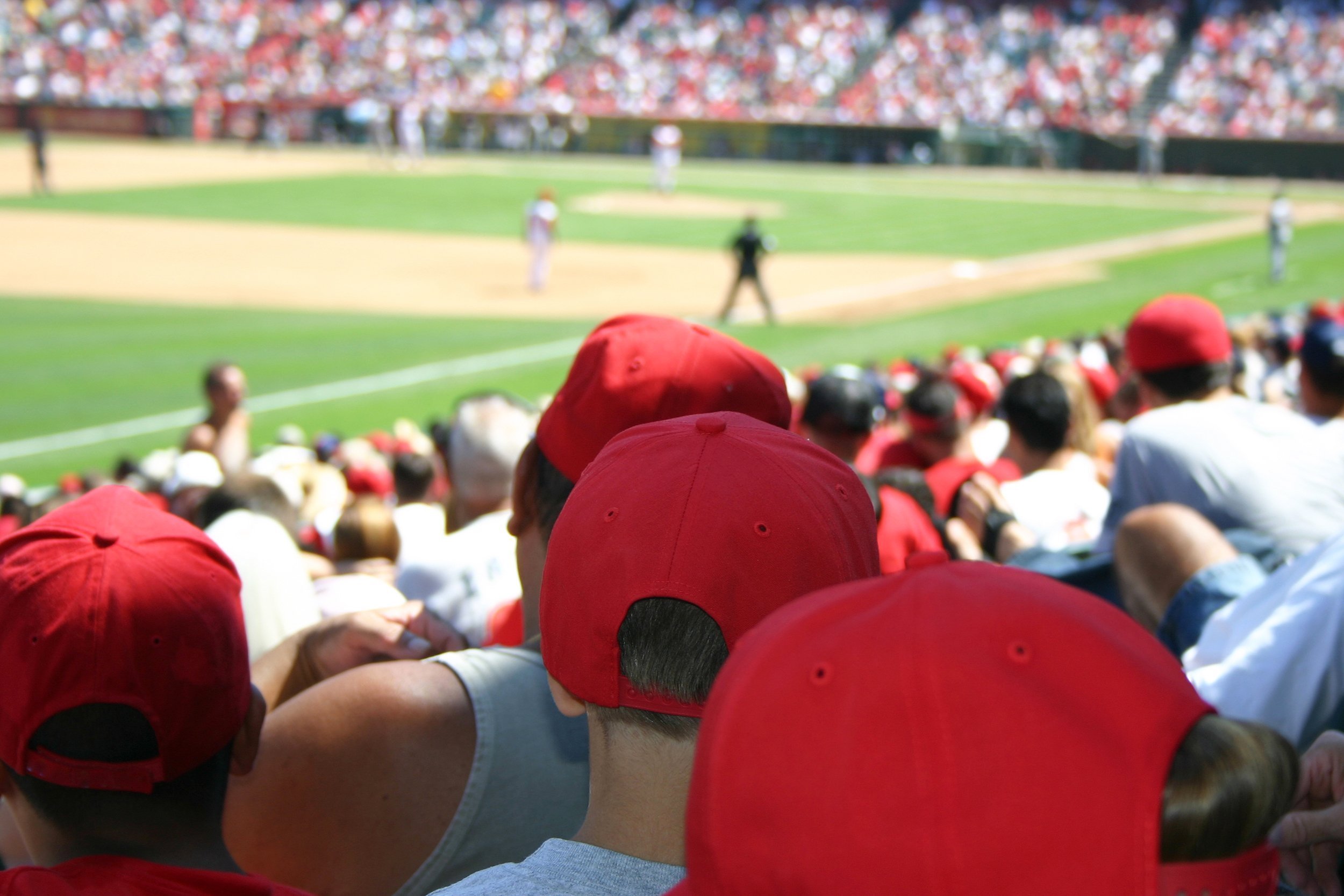 a large crowd watching a baseball game