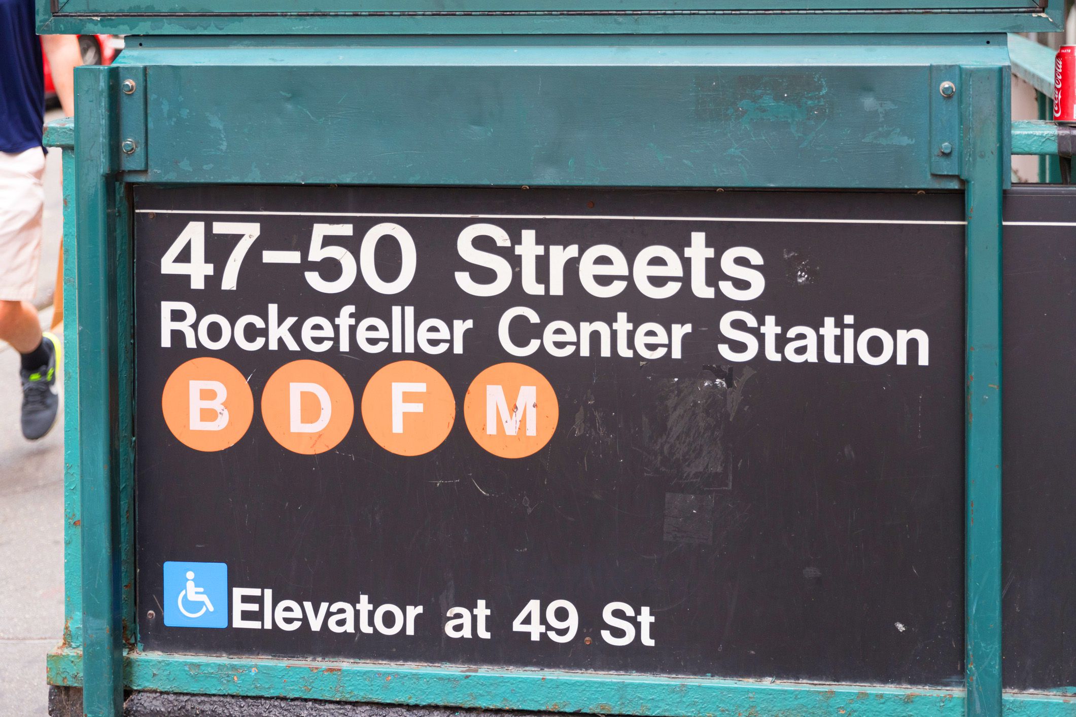 nyc subway station indication that elevator is two blocks away