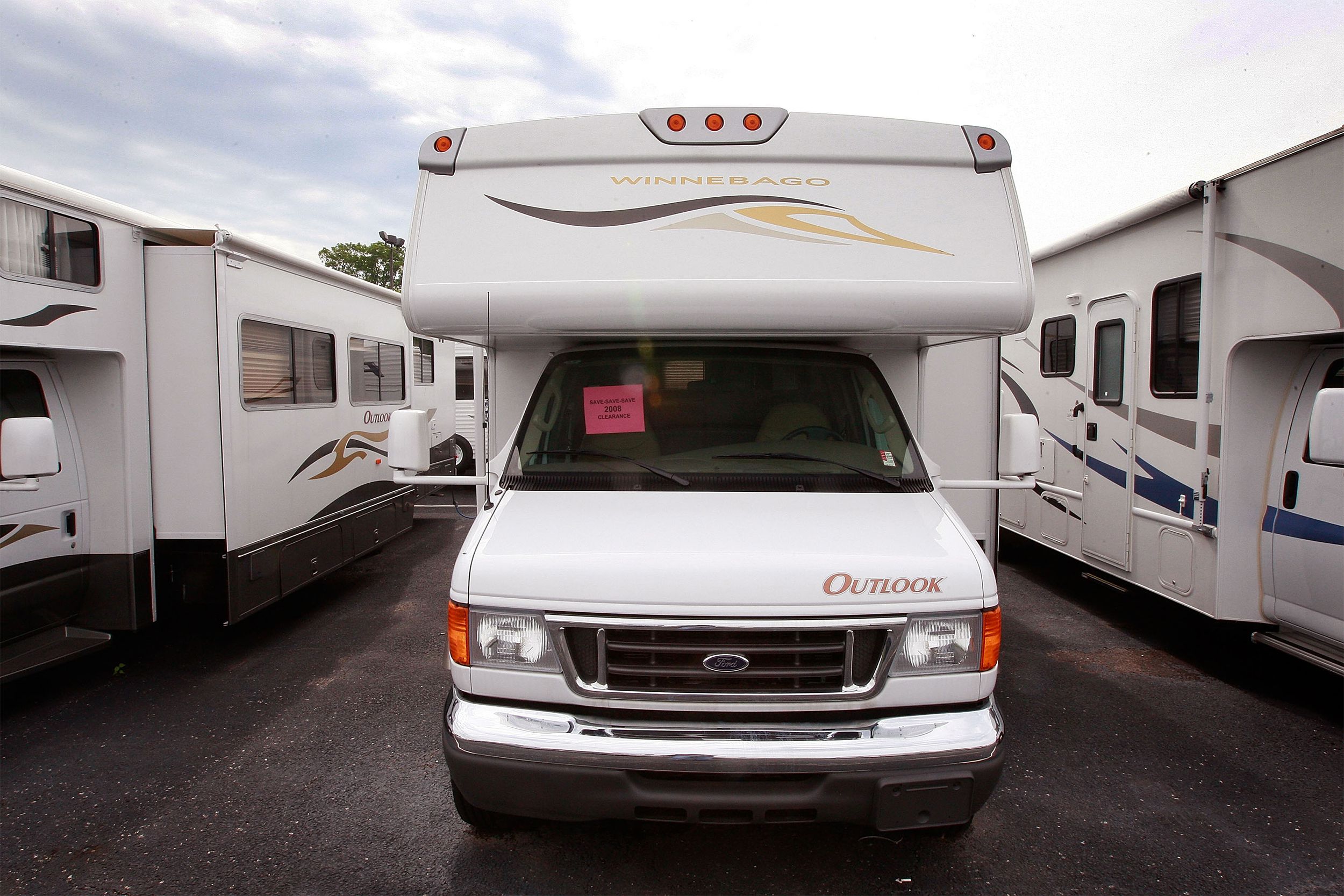 A Winnebago Outlook motor home is offered for sale at the Camp-Land RV dealership