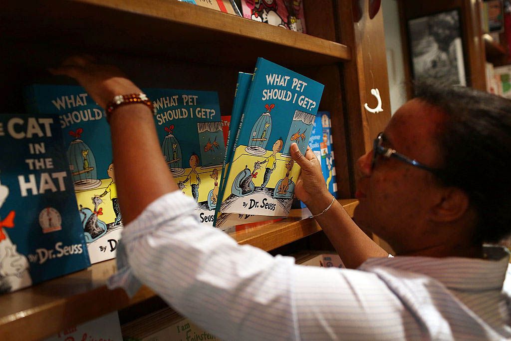 dr. seuss books being picked up at bookstore