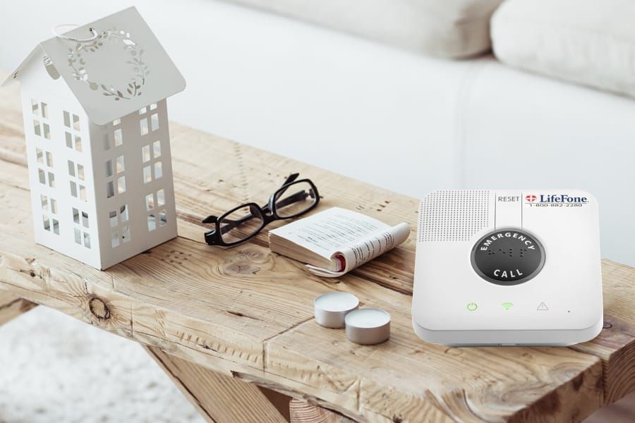 lifefone at-home protection system on wooden table