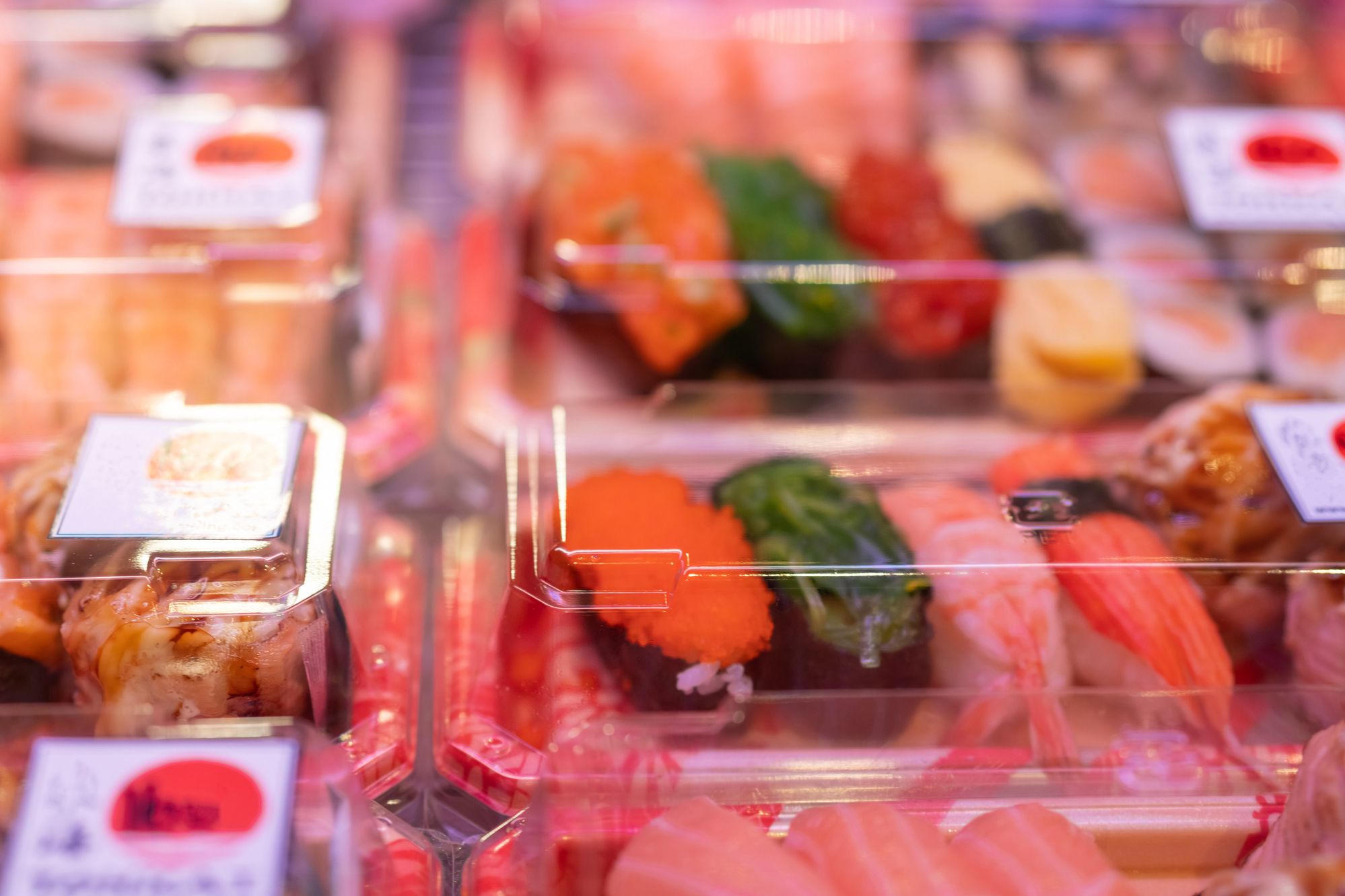 premade sushi on supermarket shelf