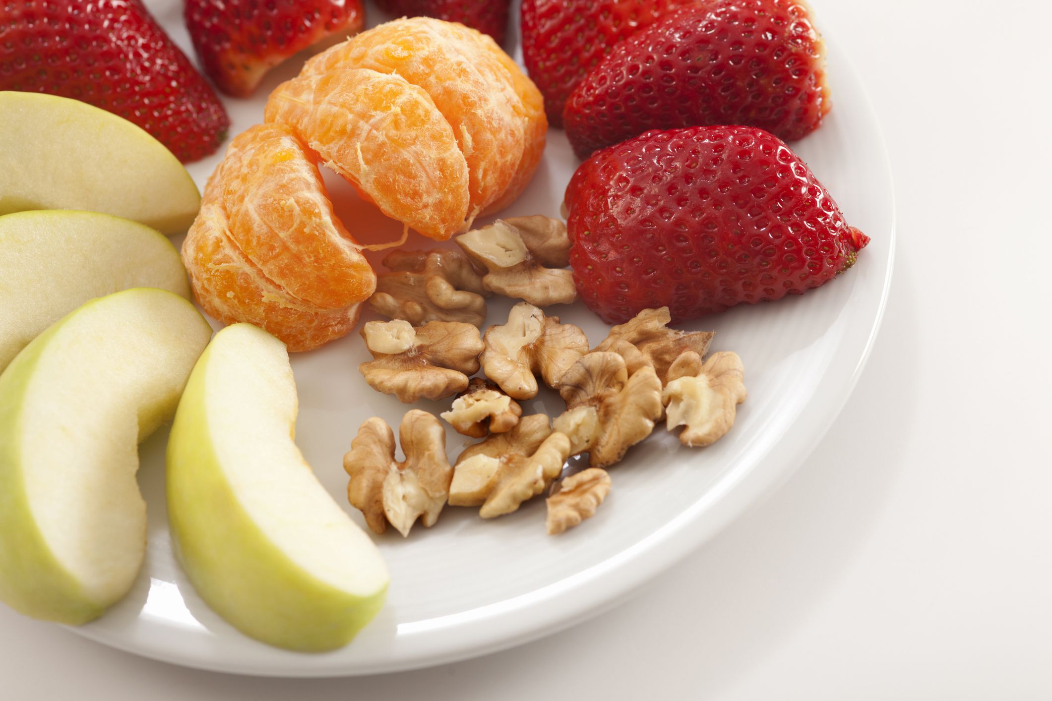 appetixer plate with nuts and fruit