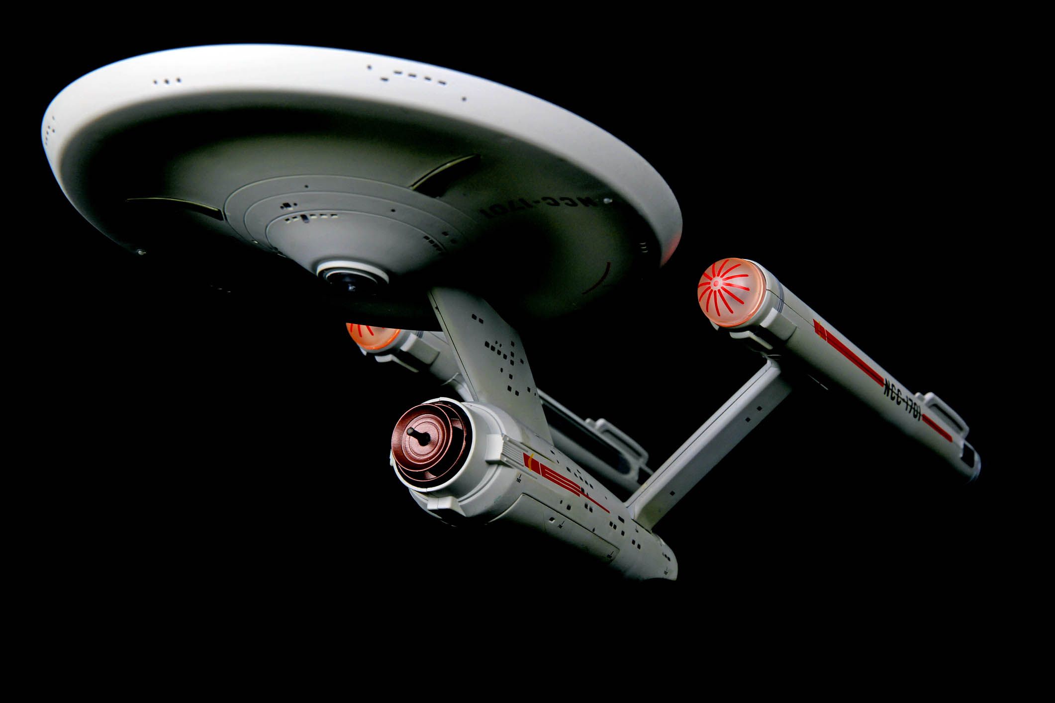 a model of the federation starship uss enterprise, commanded by captain james t. kirk in the original star trek series