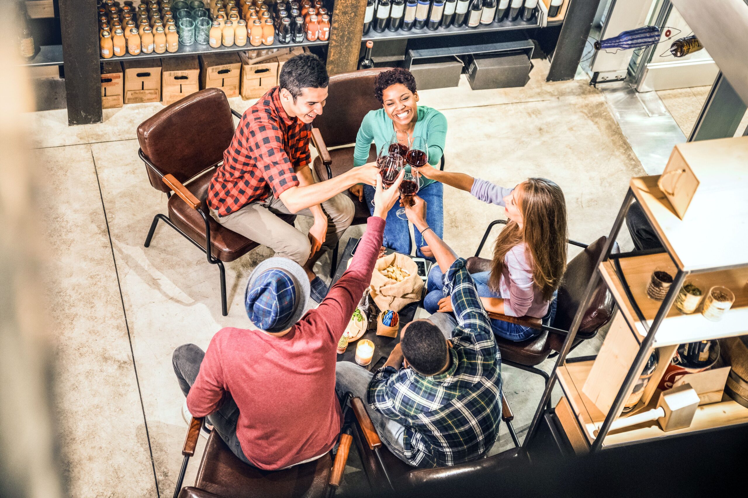 friends having wine at the grocery store