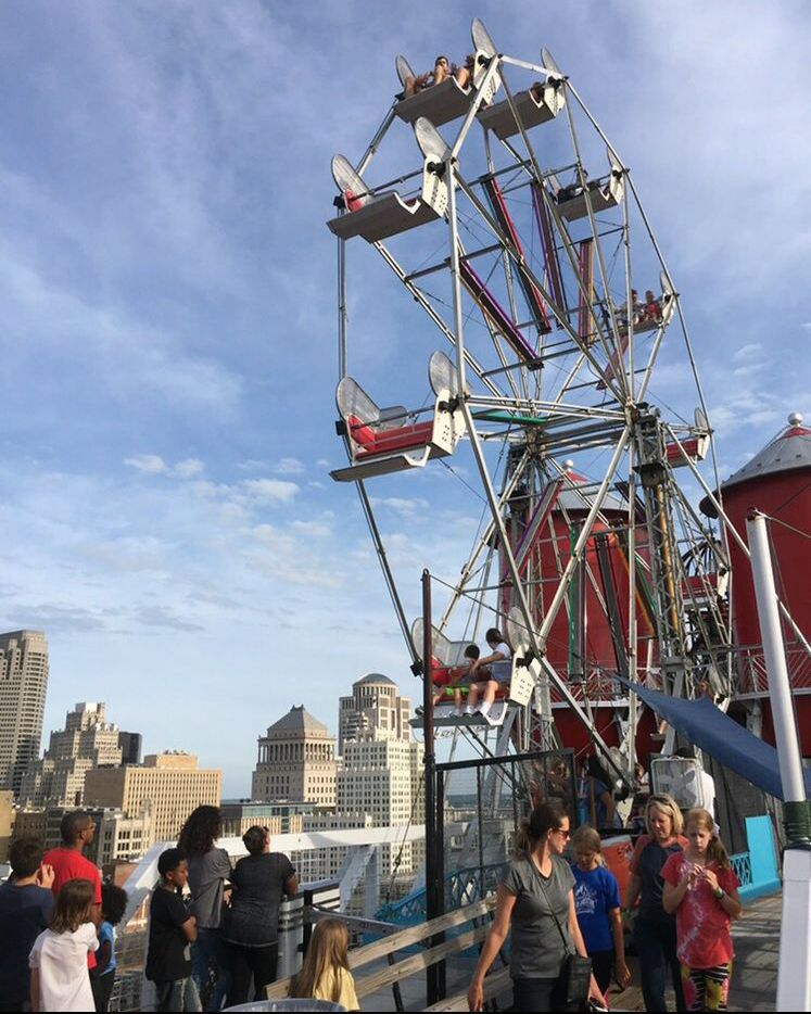 ferris wheel and st louis skyline as seen from the city museum rooftop