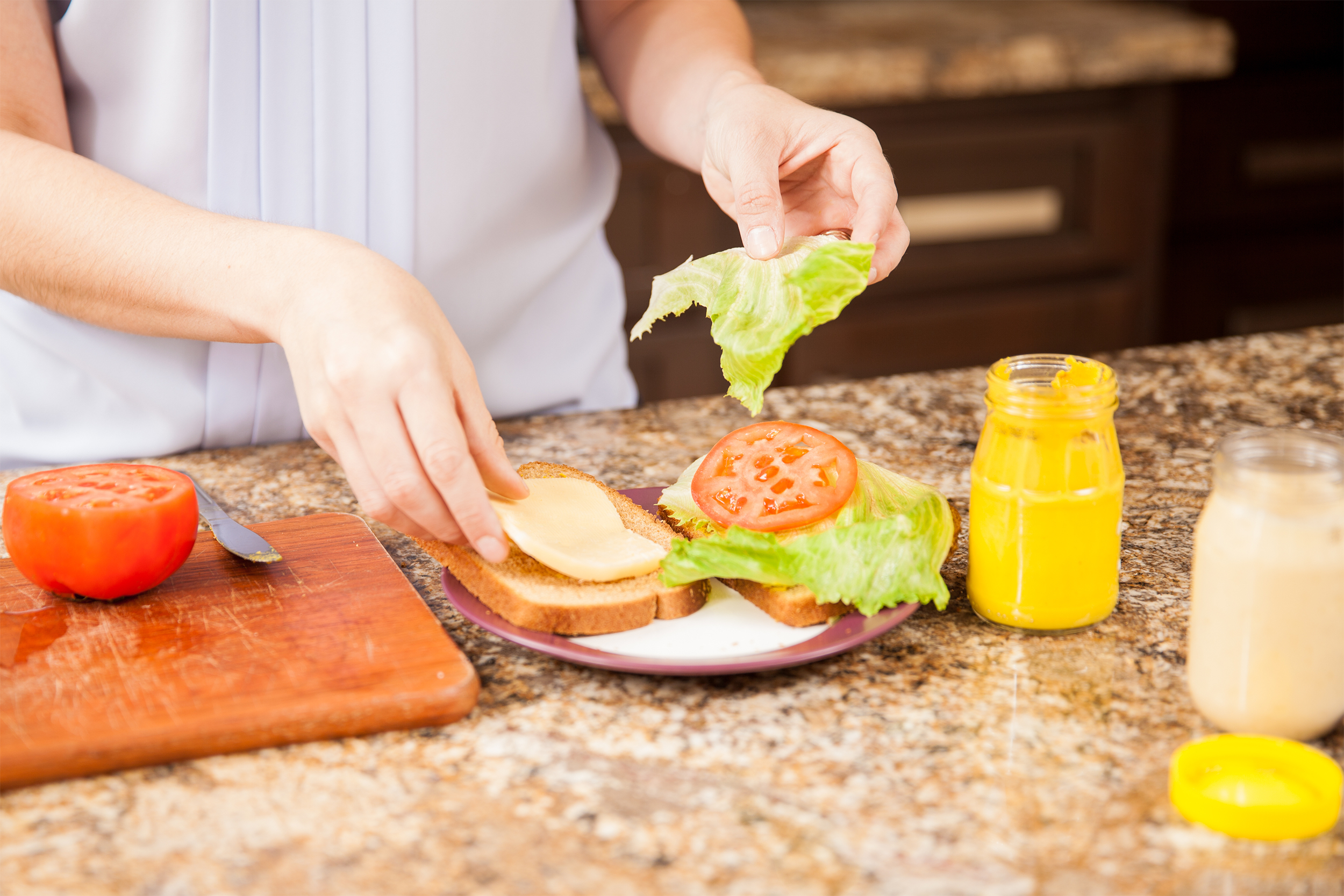 Woman making sandwiches