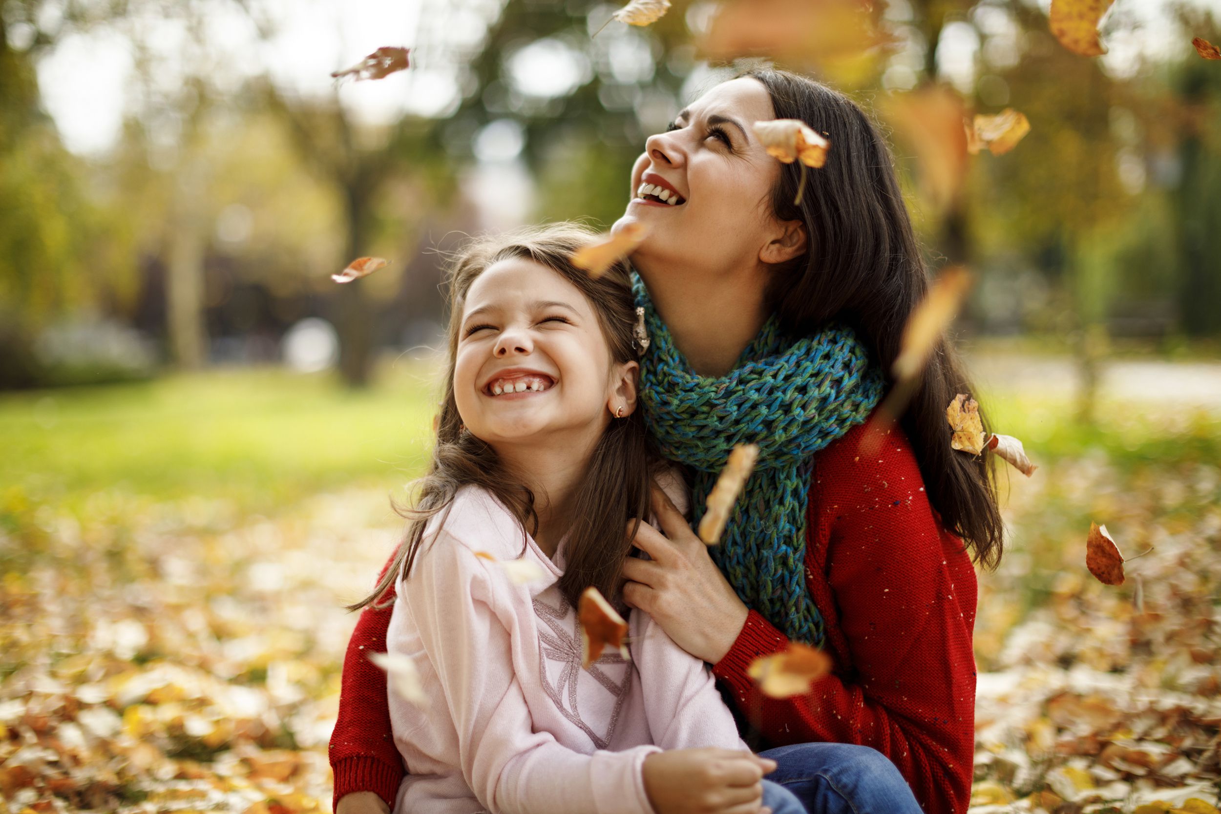 mother and daughter playing in the park
