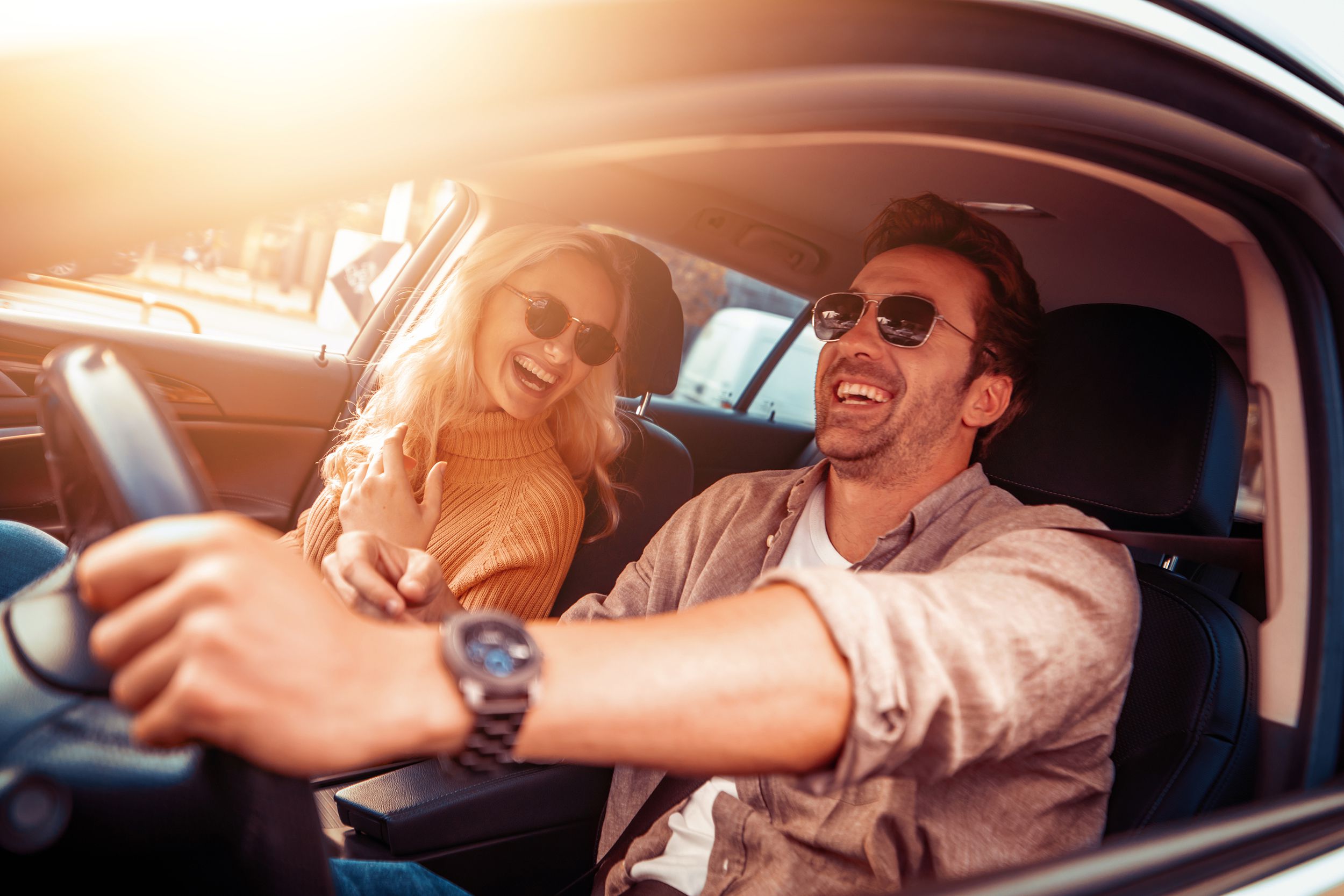 happy young couple enjoying in drive