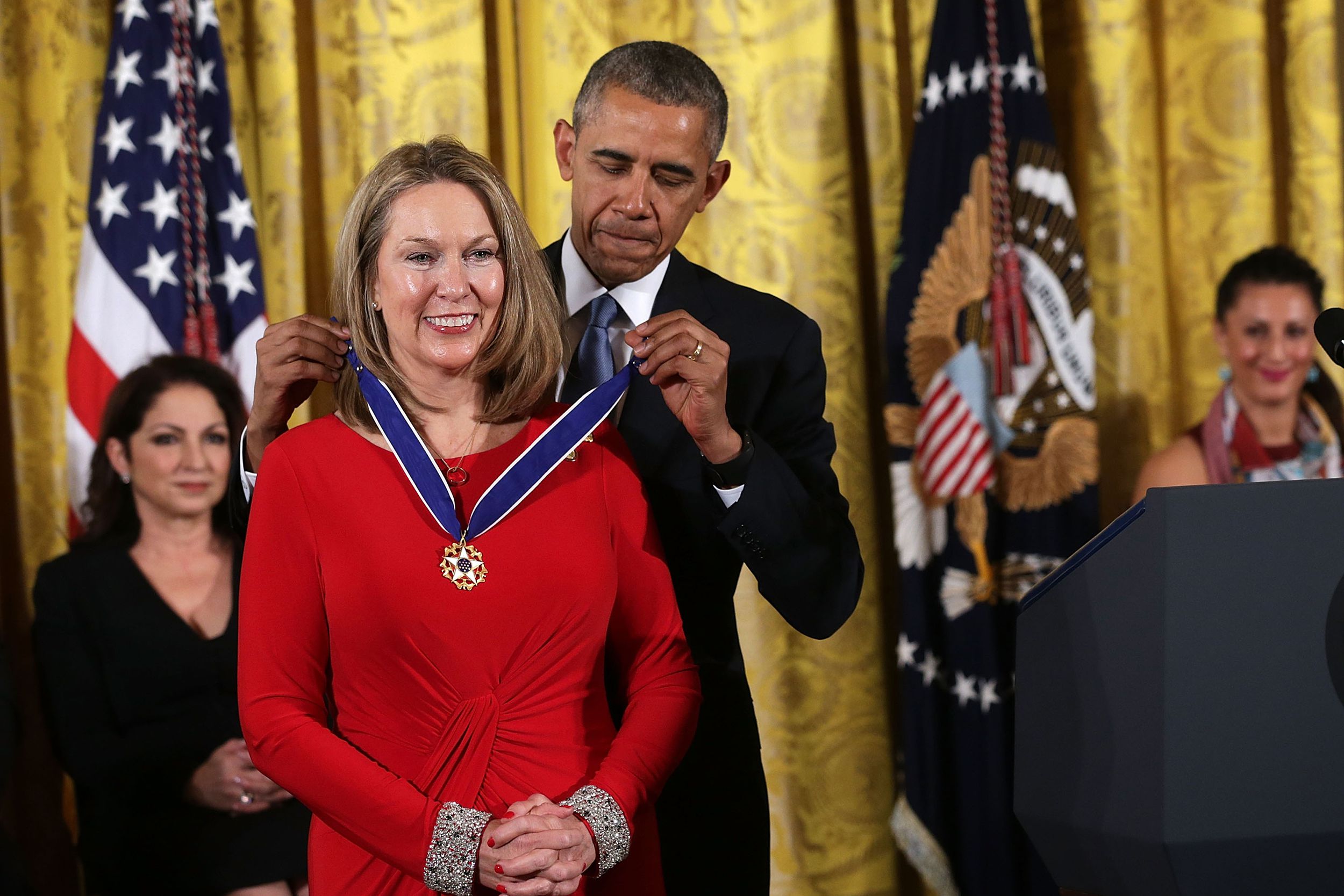 U.S. President Barack Obama presents the Presidential Medal of Freedom to Bonnie Carroll during an East Room ceremony November 24, 2015 at the White House in Washington, DC.