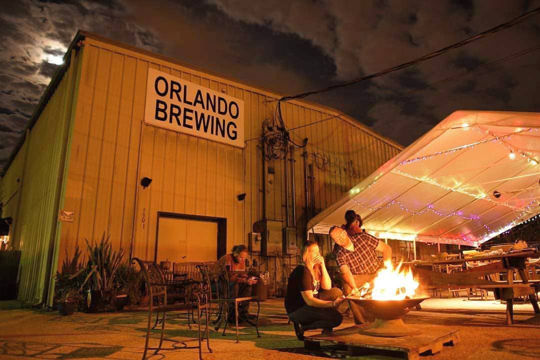 orlando brewing exterior and patio, fire burning, tables