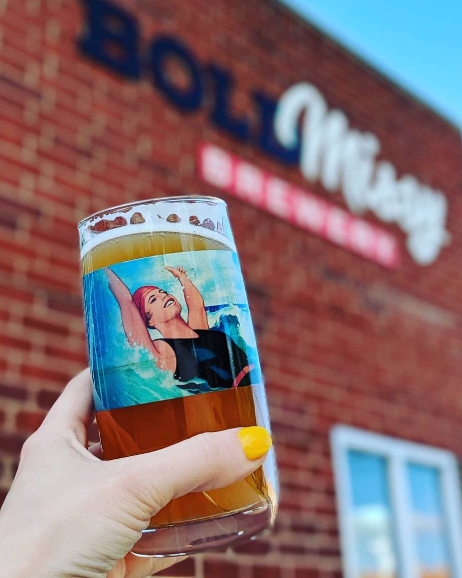 can of bold missy beer in front of bold missy taproom