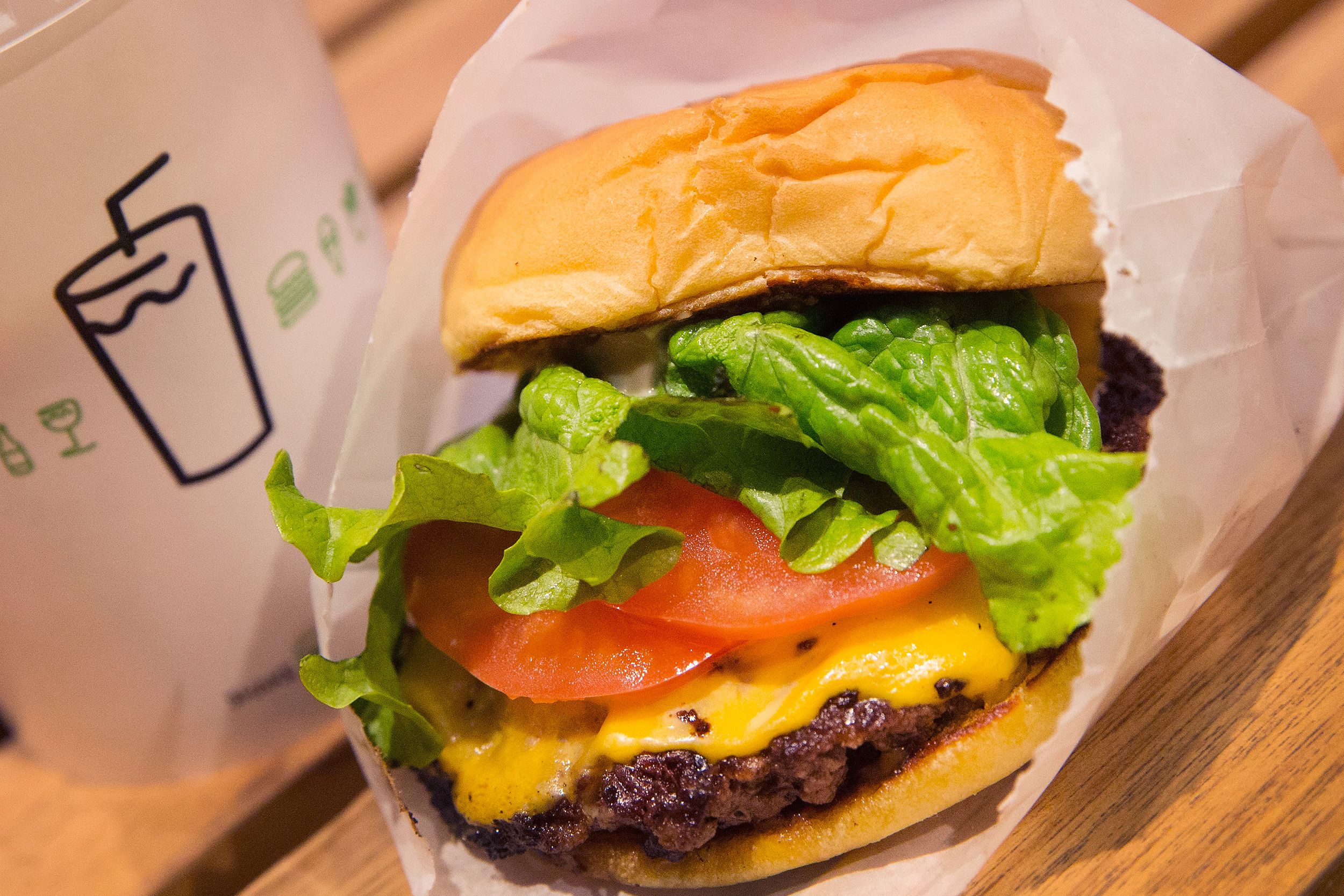 A cheeseburger is served up at a Shake Shack restaurant on January 28, 2015 in Chicago, Illinois.