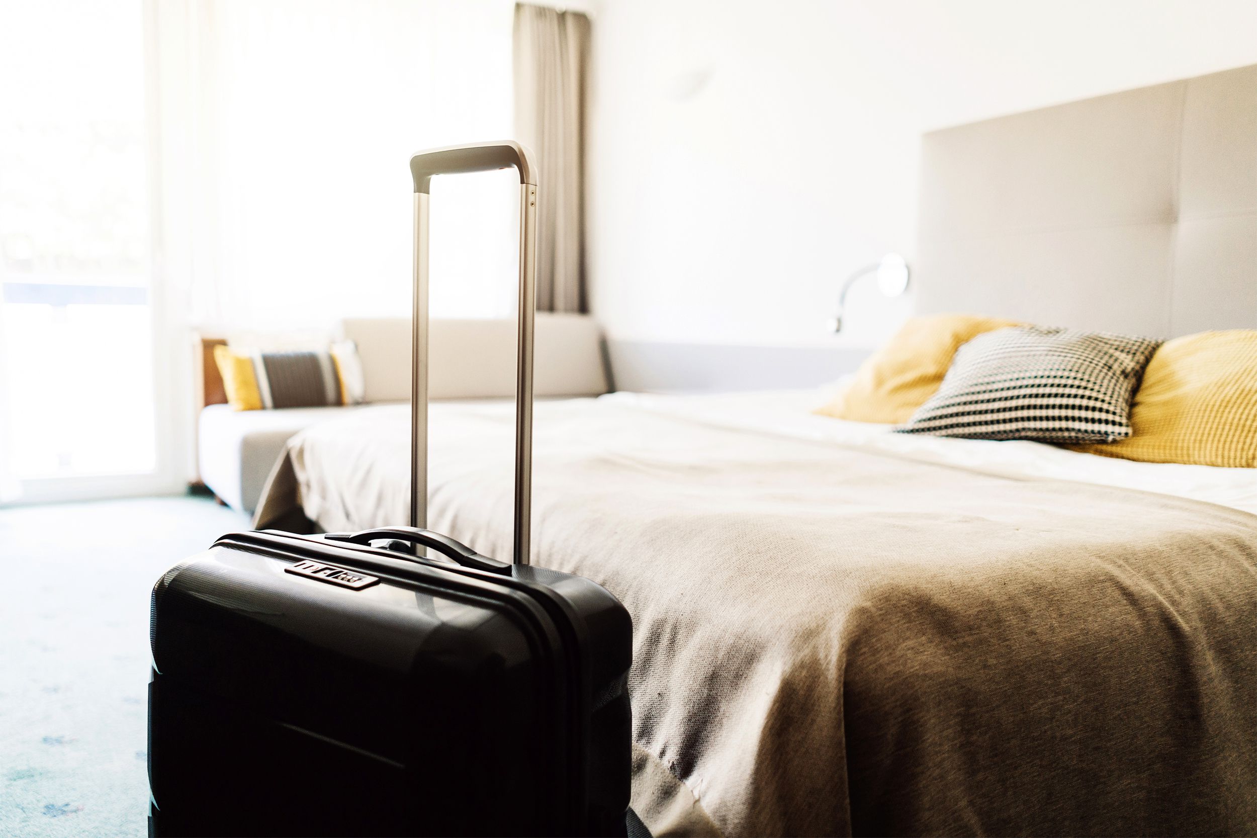 Suitcase in a hotel room