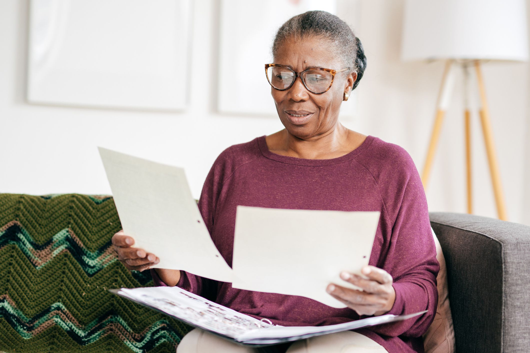 middle-aged woman analyzing papers