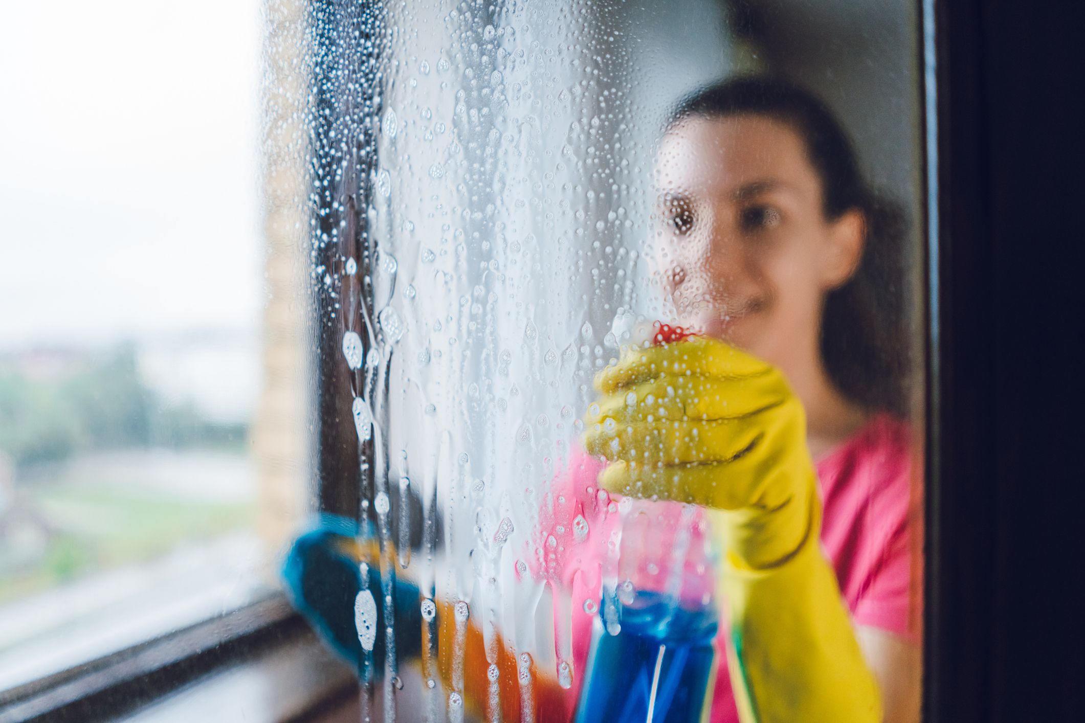 cleaning spray on window
