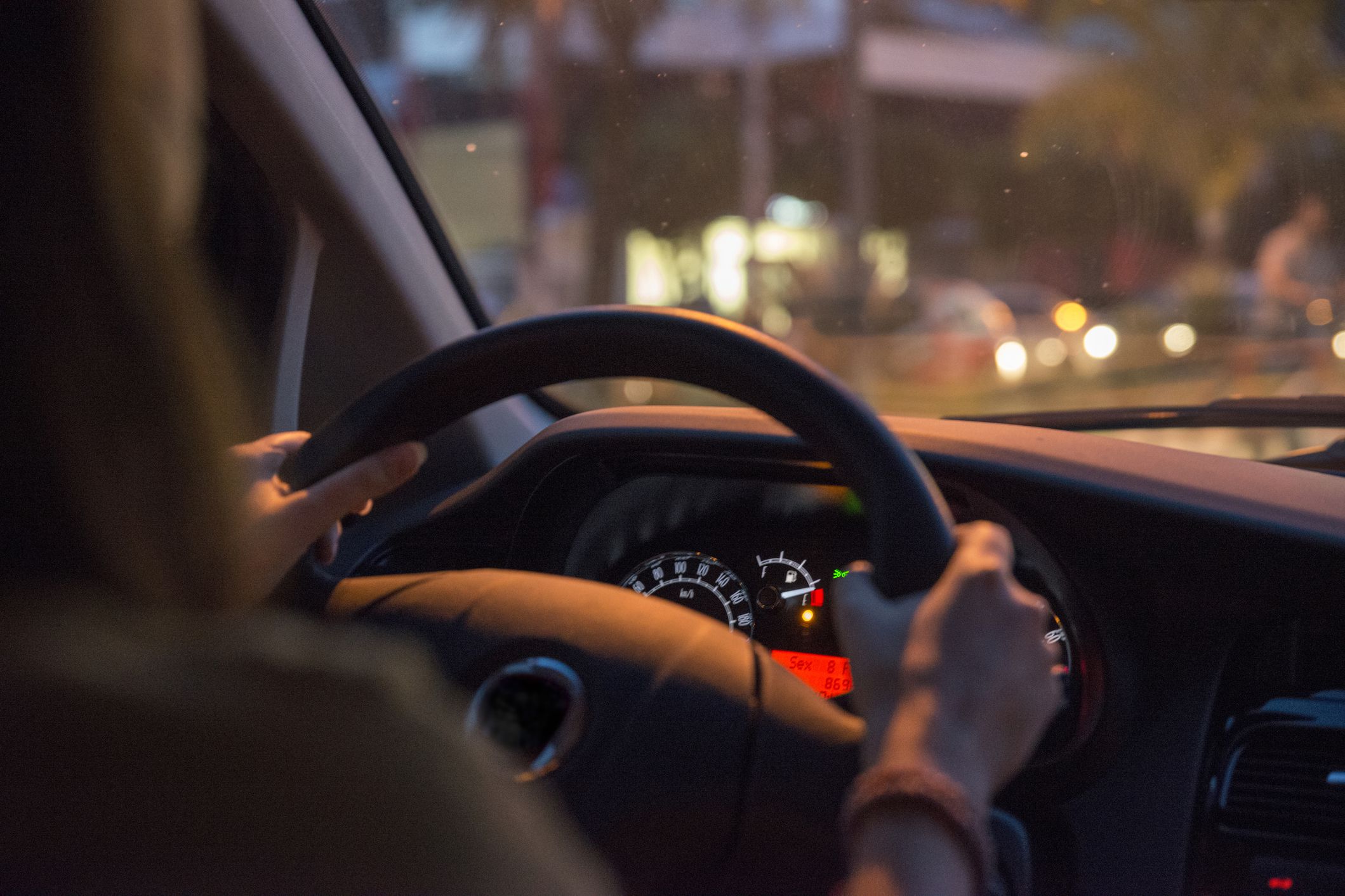 close-up of driver at night