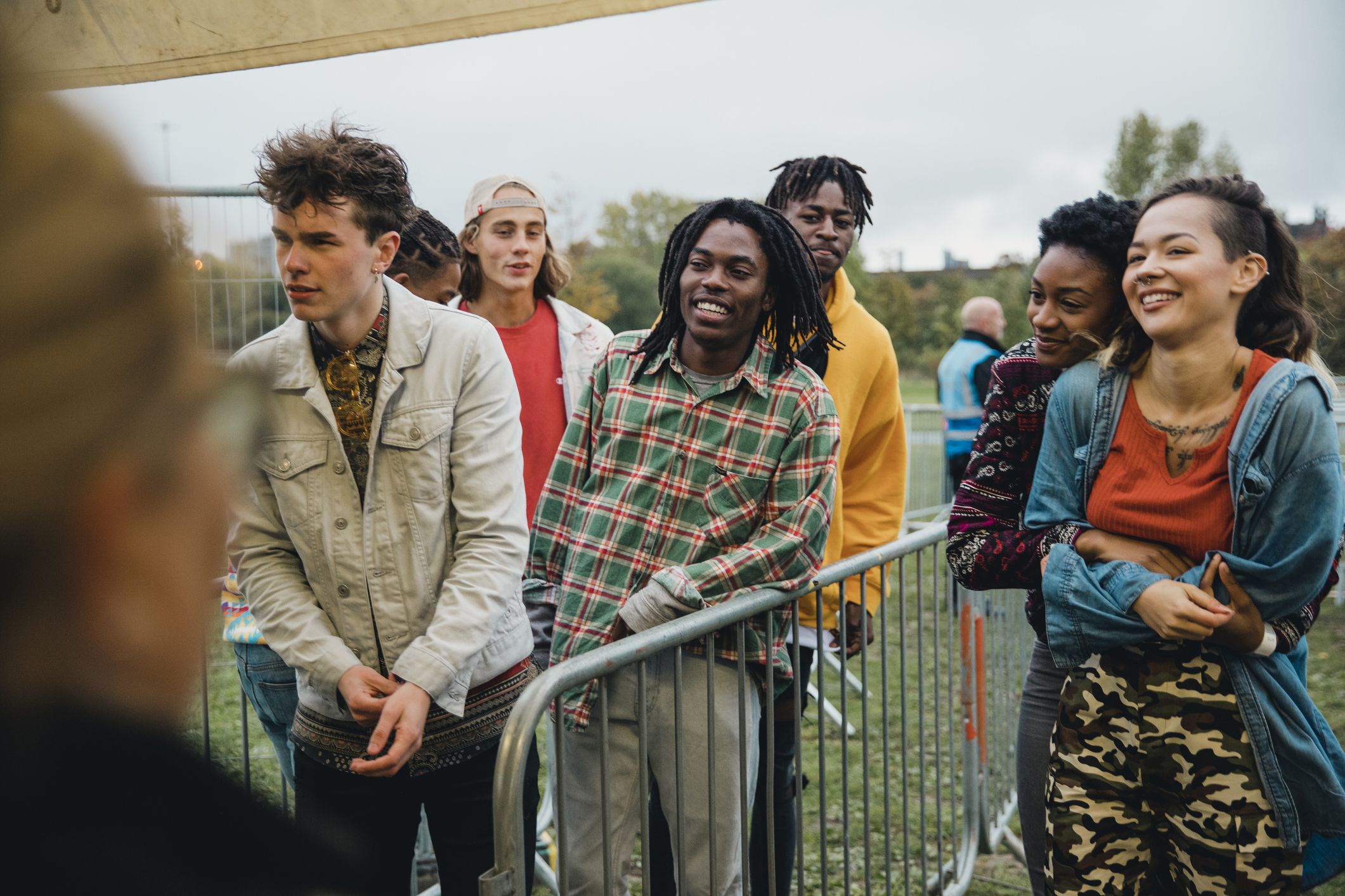 young people lined up for festival entry