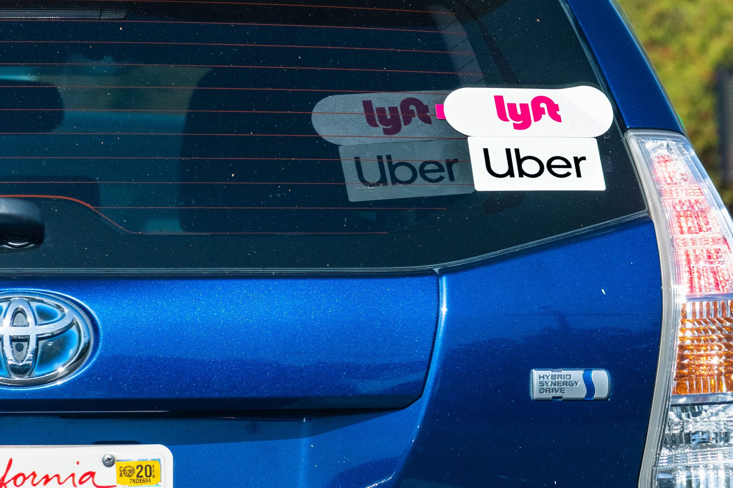 car with lyft and uber stickers