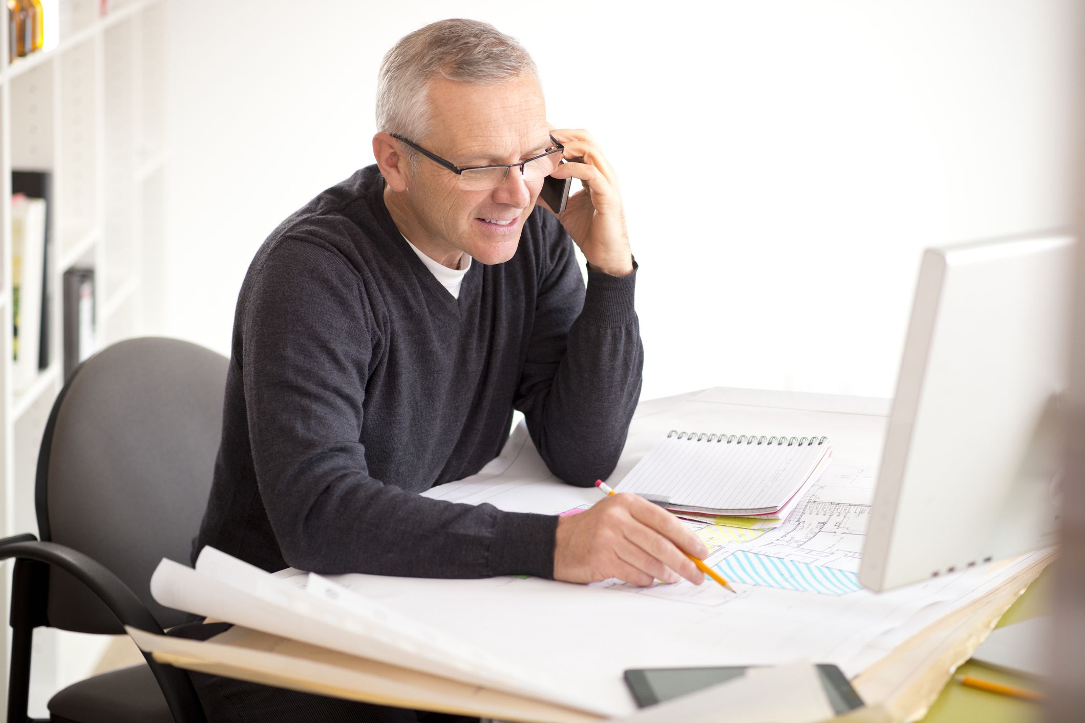 senior man looking at laptop