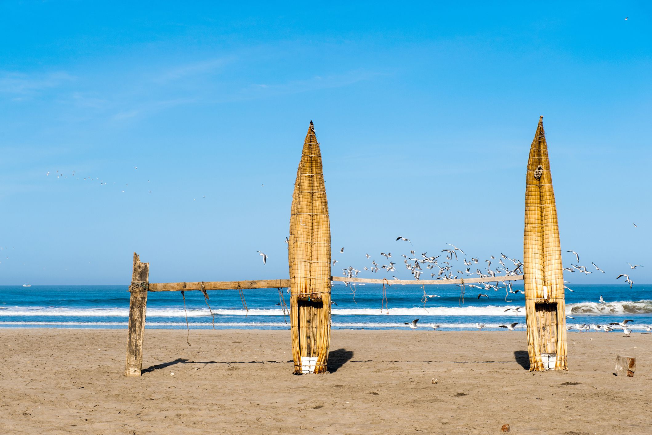 traditional peruvian small reed boats in huanchaco