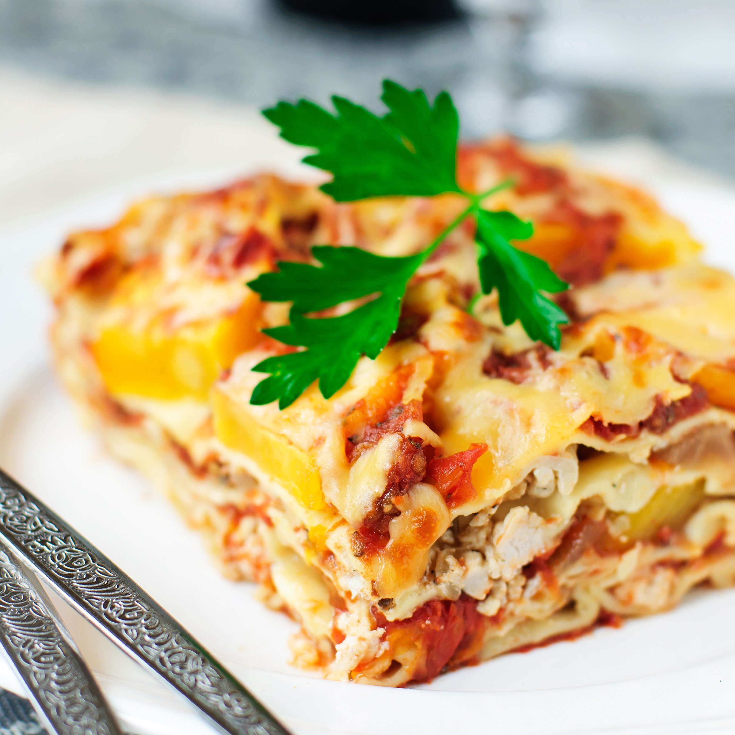 piece of chicken and pumpkin lasagna