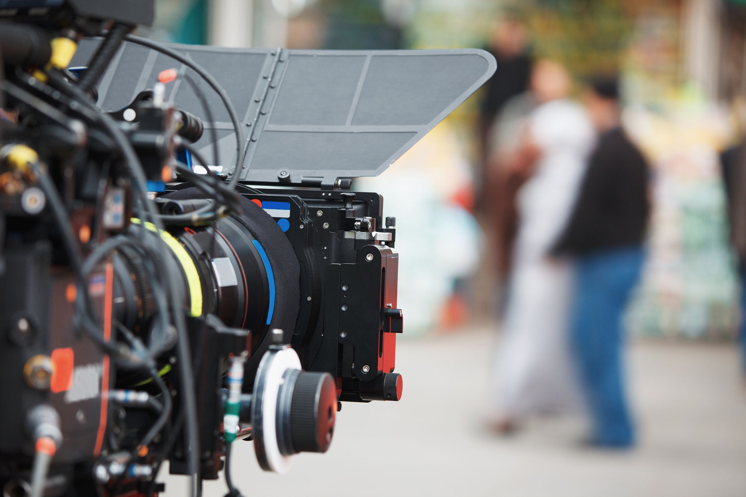 professional film camera filming scene outdoors