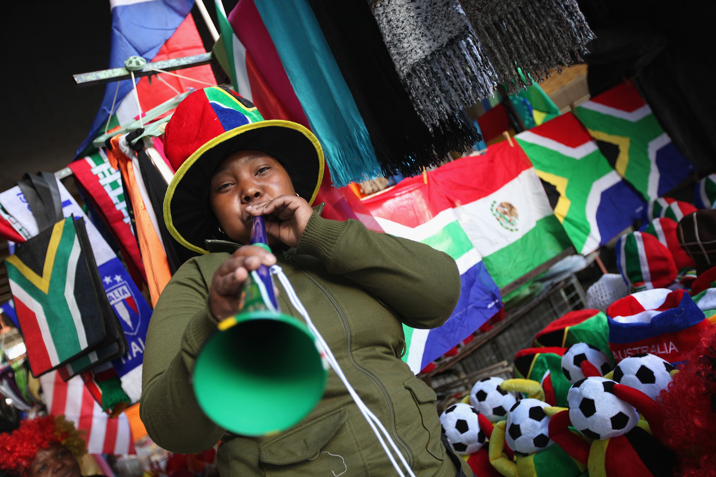 A woman blows a Vuvuzela in central Cape Town on June 8, 2010 in Cape Town, South Africa.