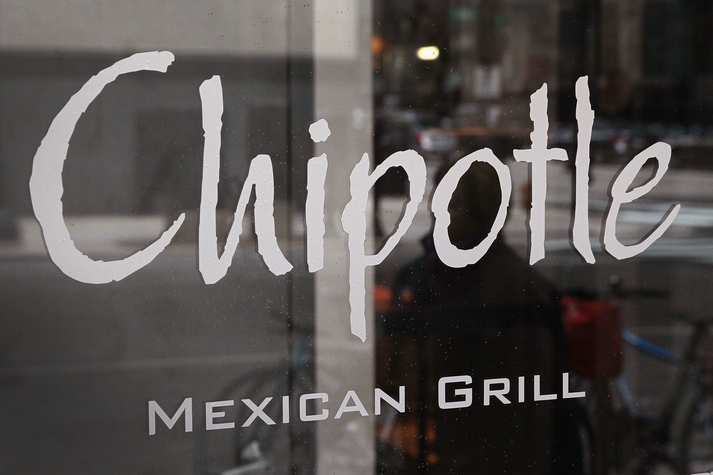 A sign marks the location of a Chipotle restaurant on October 25, 2017 in Chicago, Illinois. Chipotle stock fell more than 14 percent today after a weak 3Q earnings.