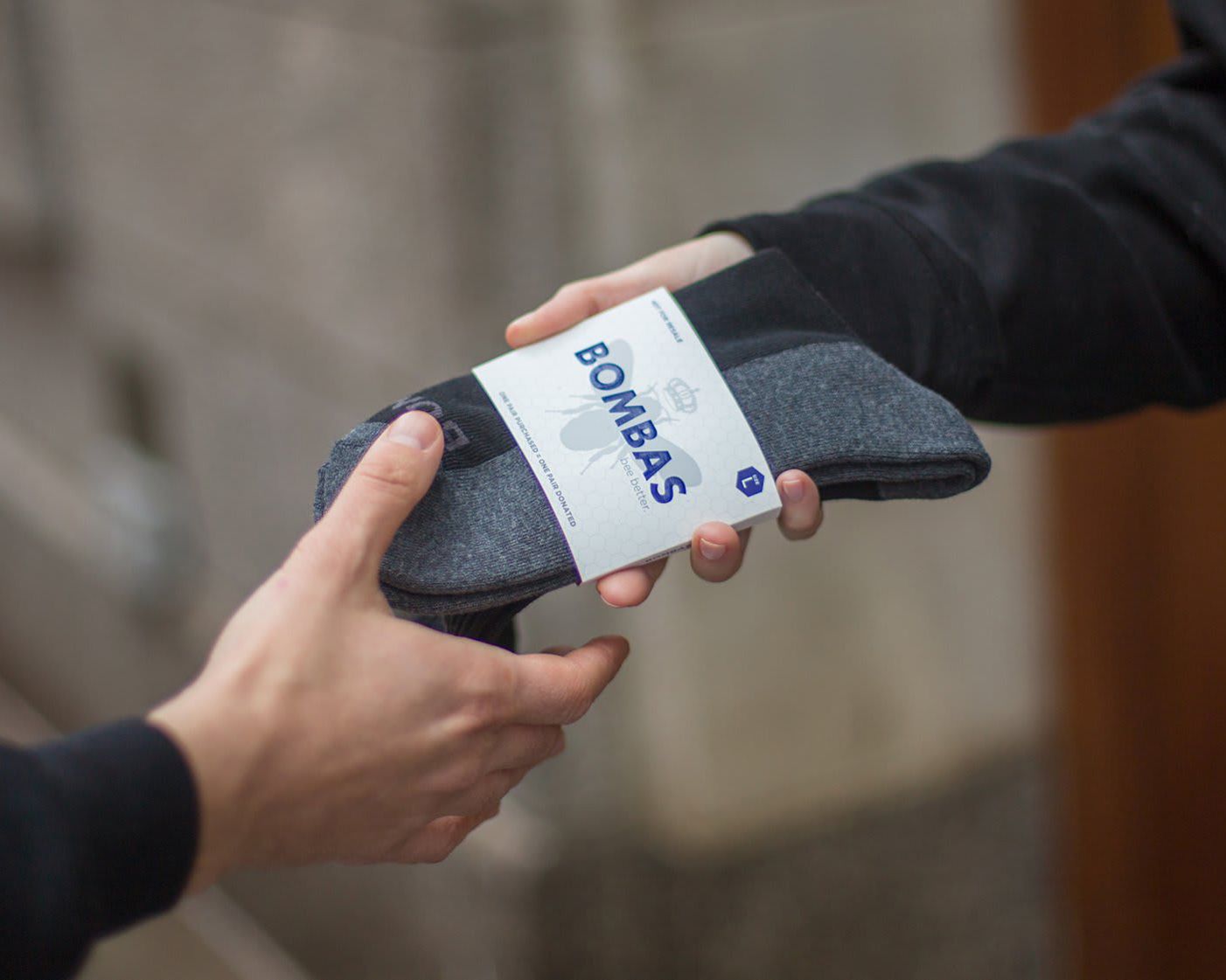 pair of bombas socks being exchanged