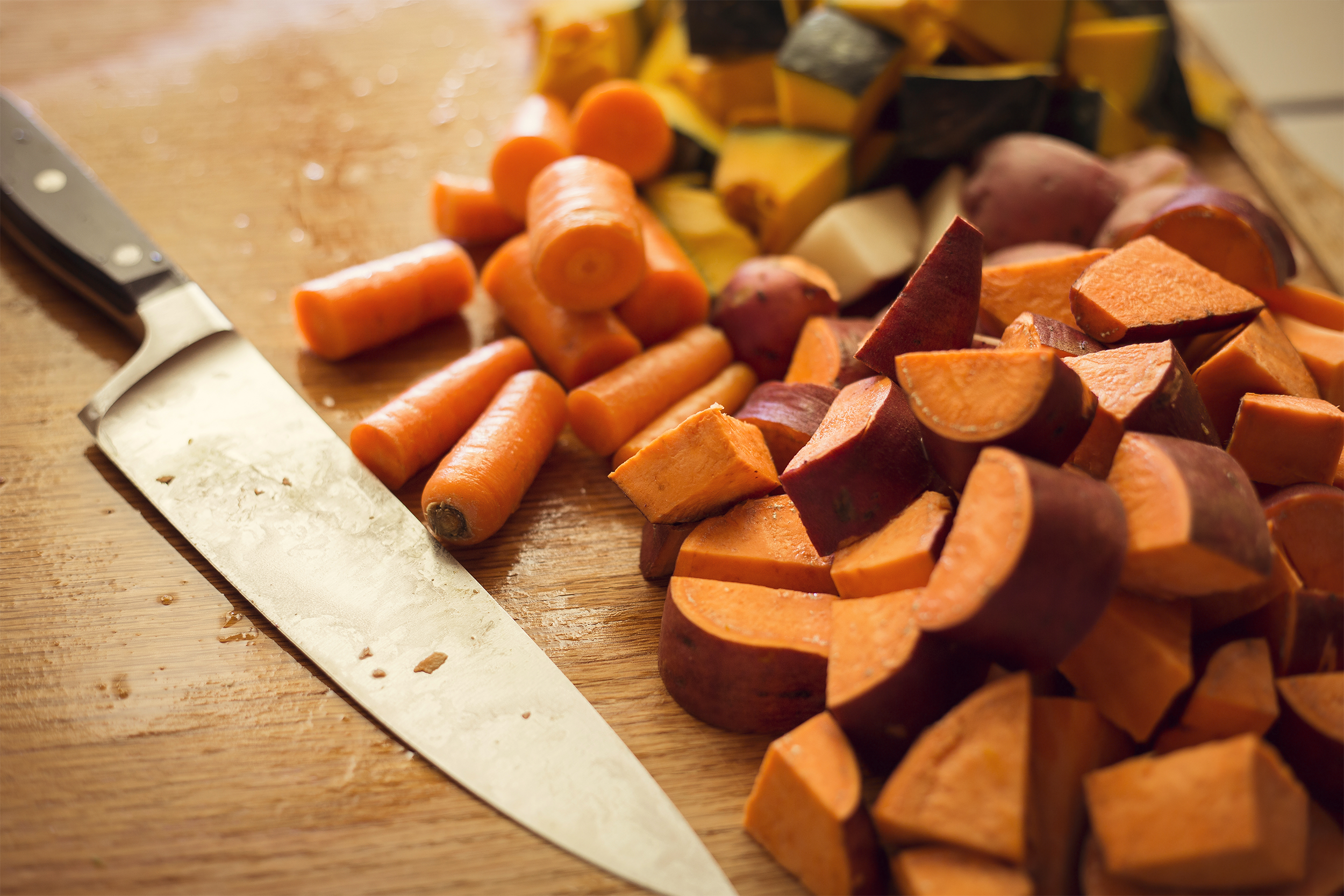 Knife with chopped vegetables