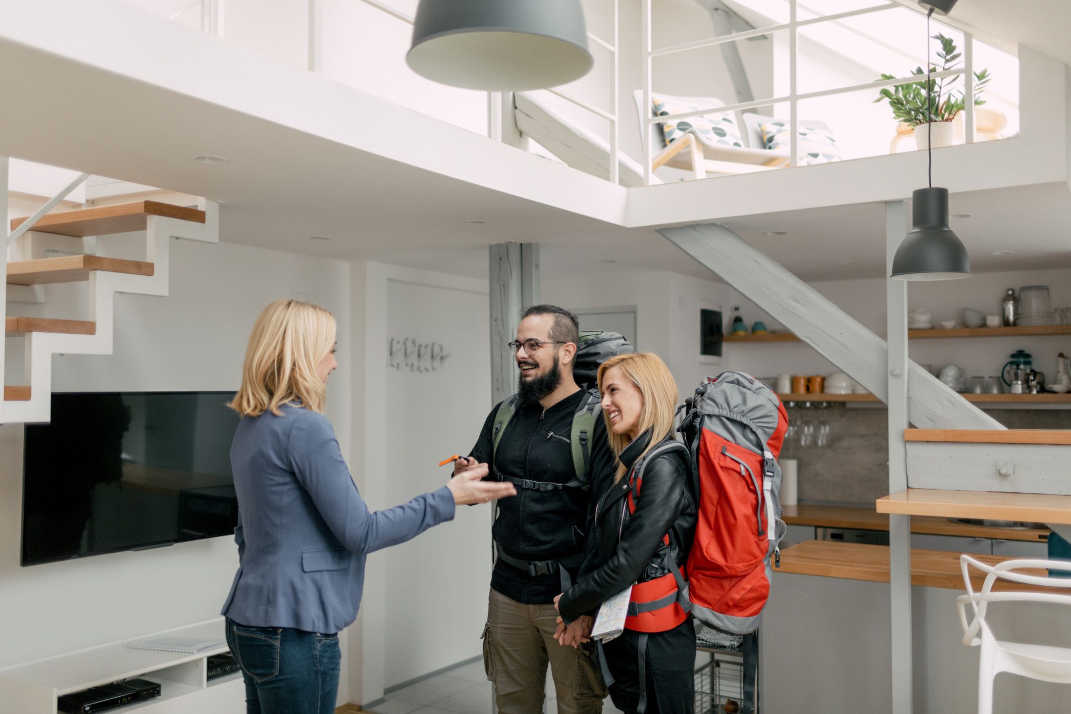 couple checking into airbnb