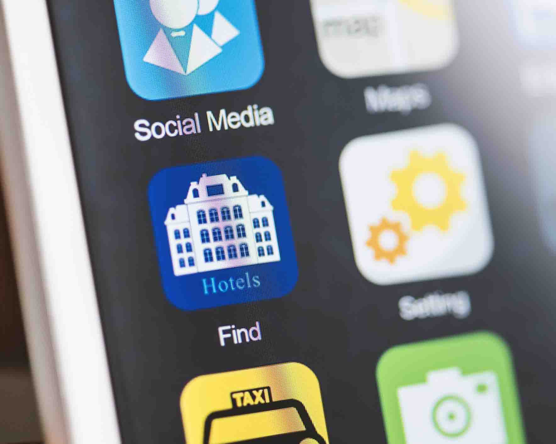 close-up of hotel app on smartphone