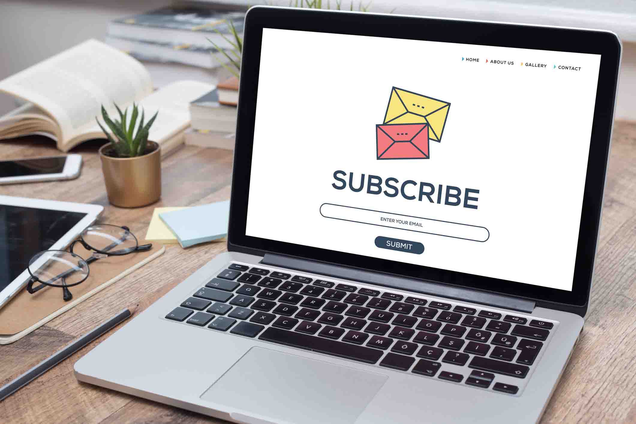 open laptop with web subscription page
