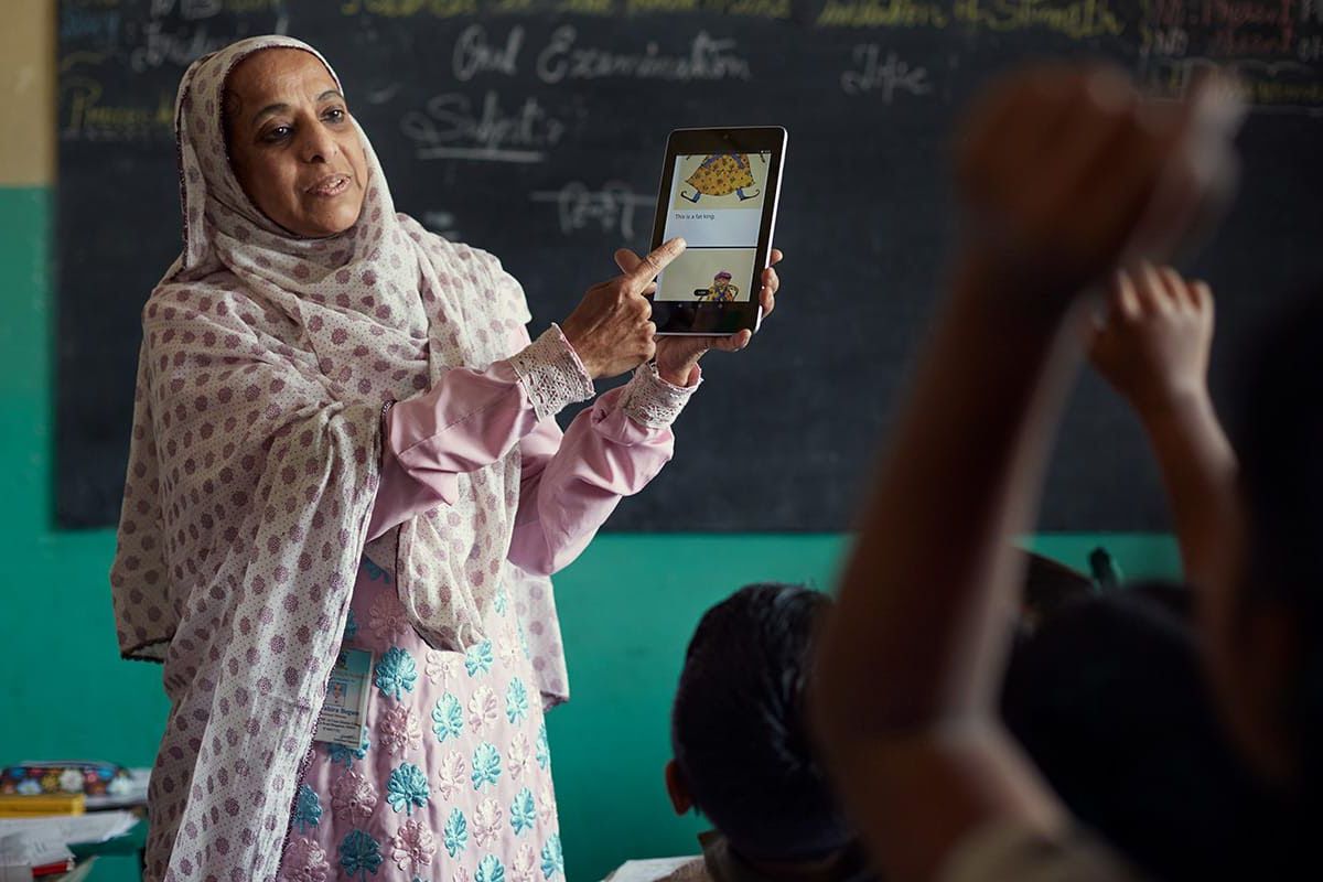 teacher using pratham books’ storyweaver is an online platform on tablet