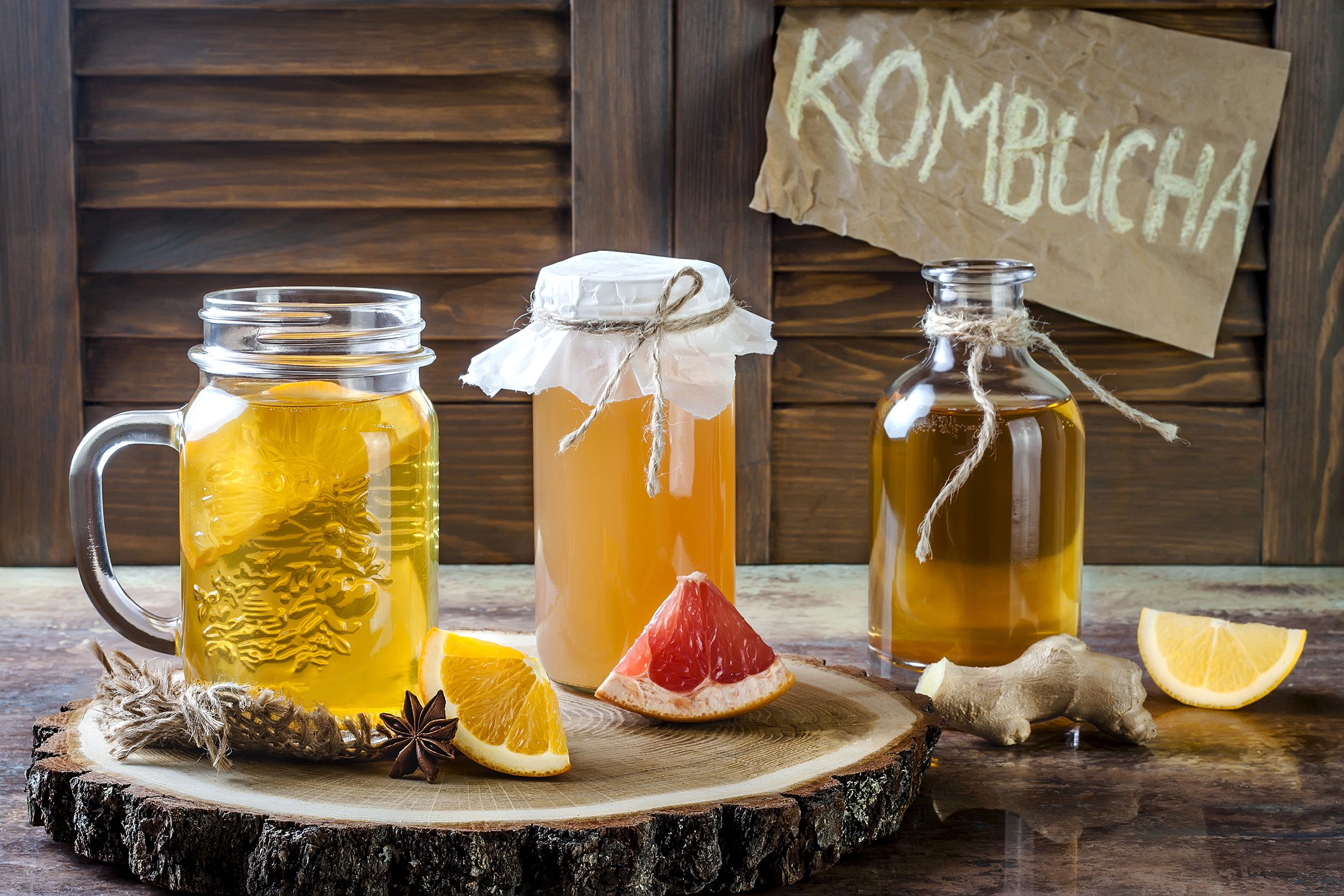 homemade fermented raw kombucha tea with different flavorings