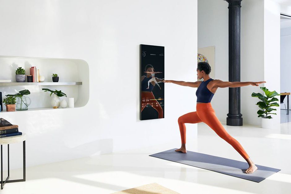woman doing workout with Mirror