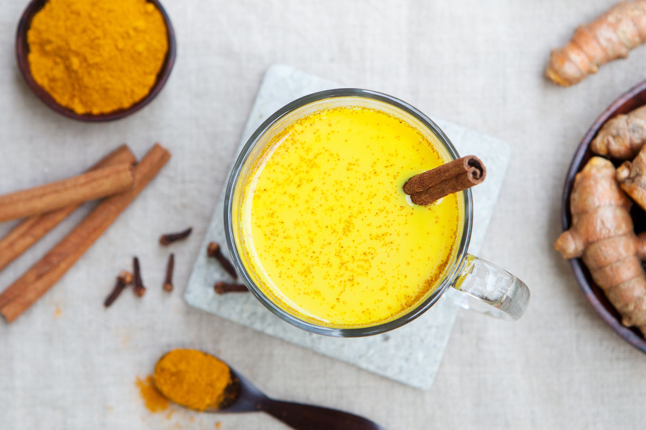 turmeric drink, latte, tea, milk with cinnamon