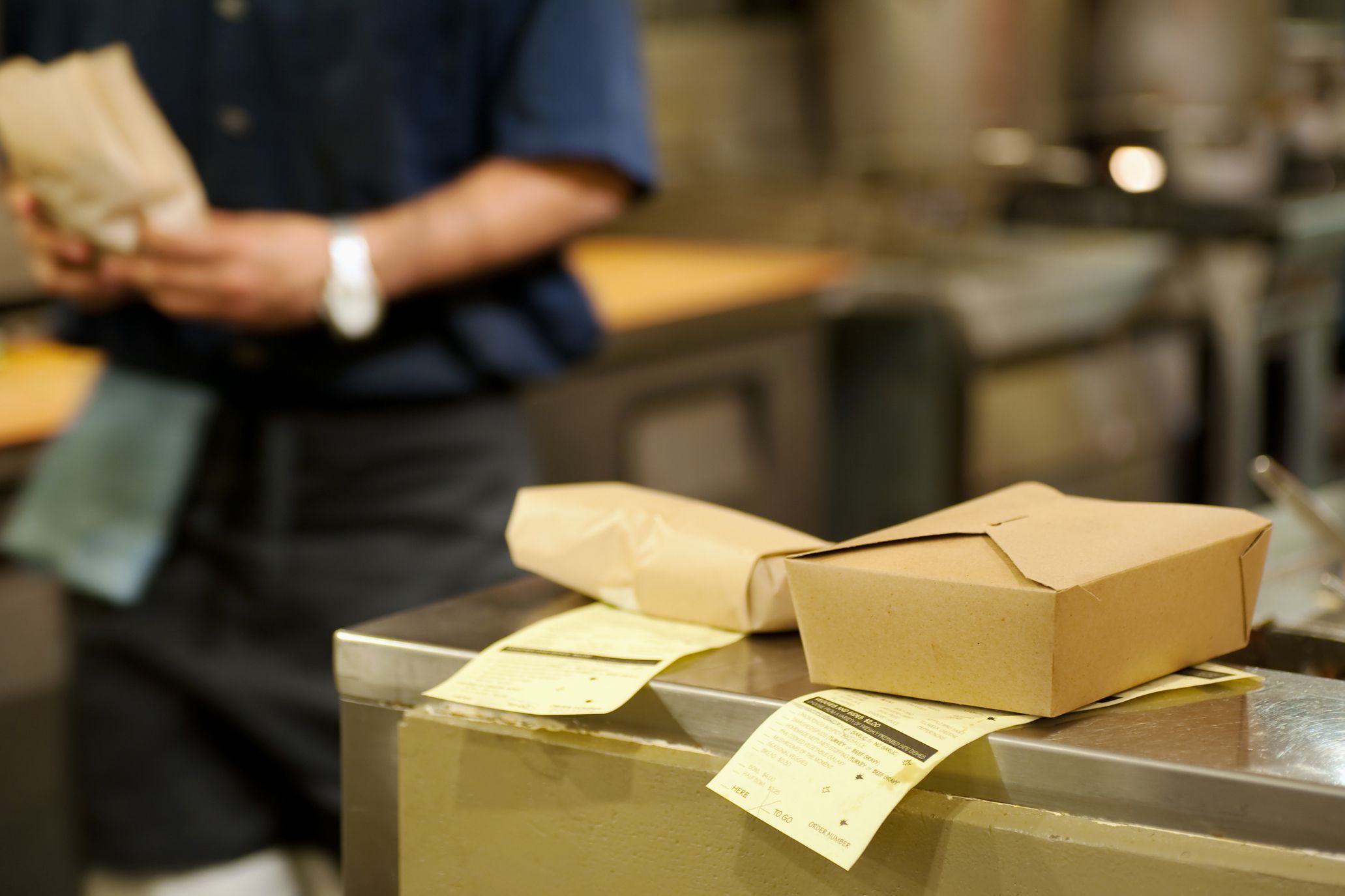 close-up of takeout orders in kitchen
