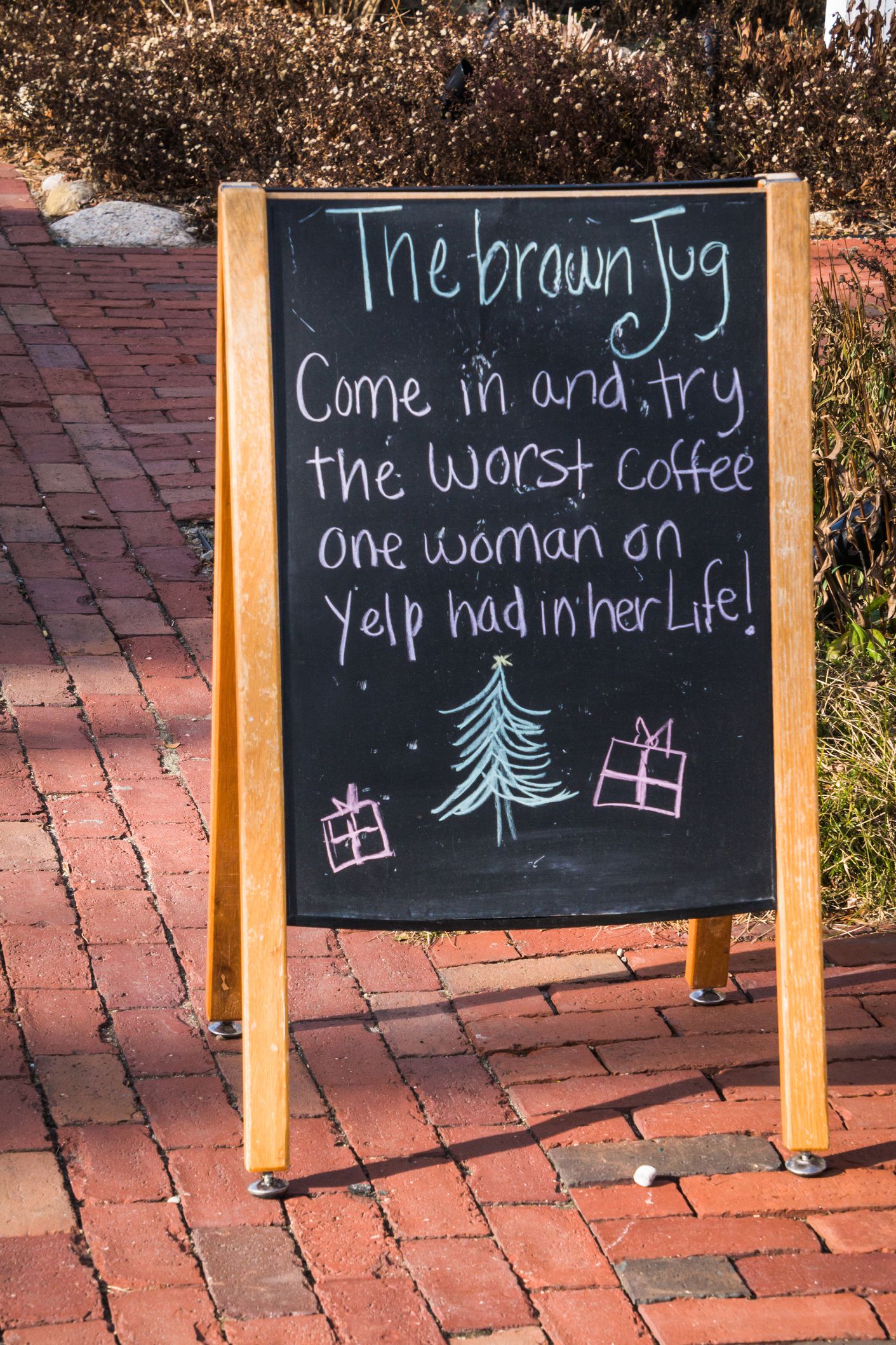 cafe sign referencing bad yelp review