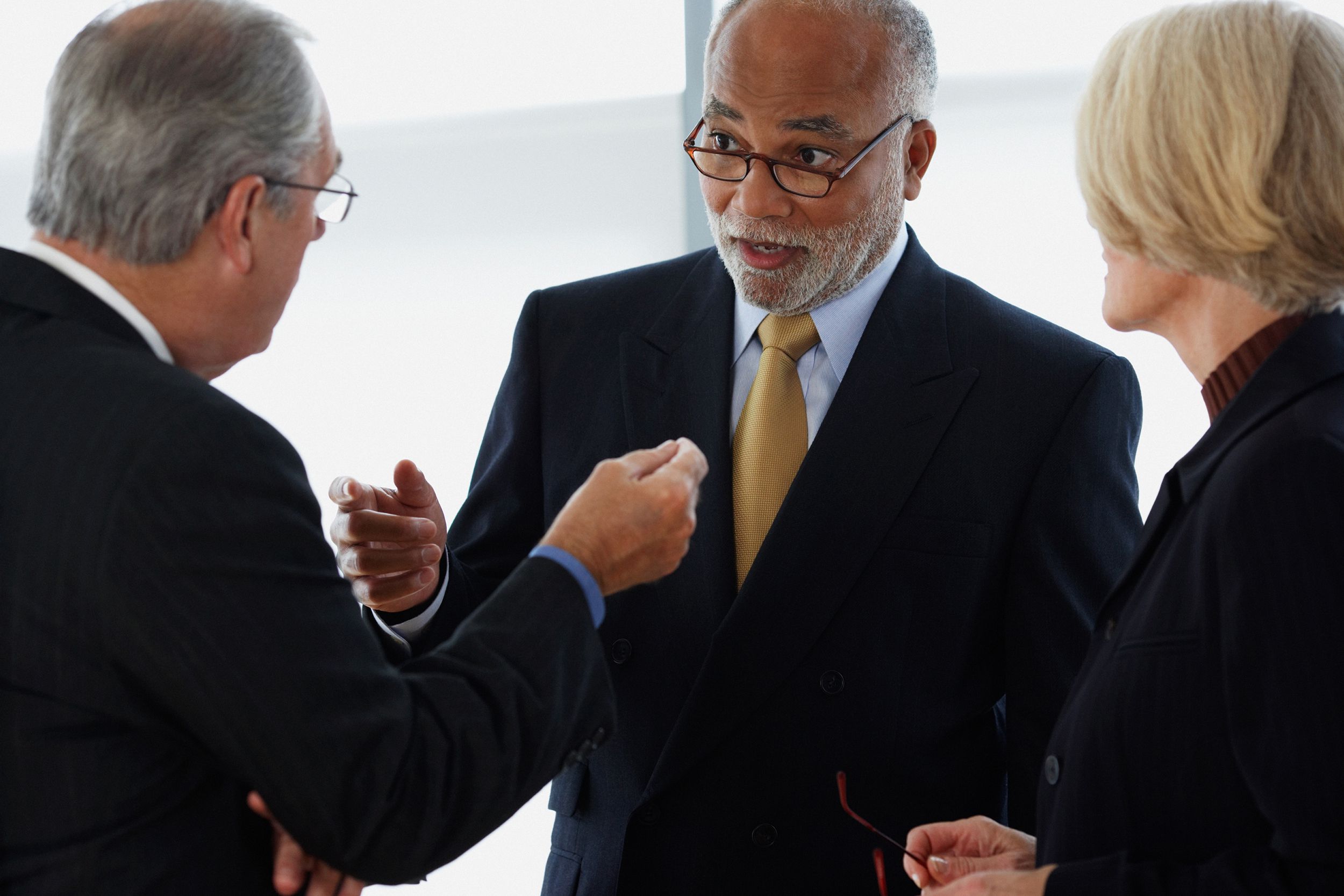 three ceos having a discussion