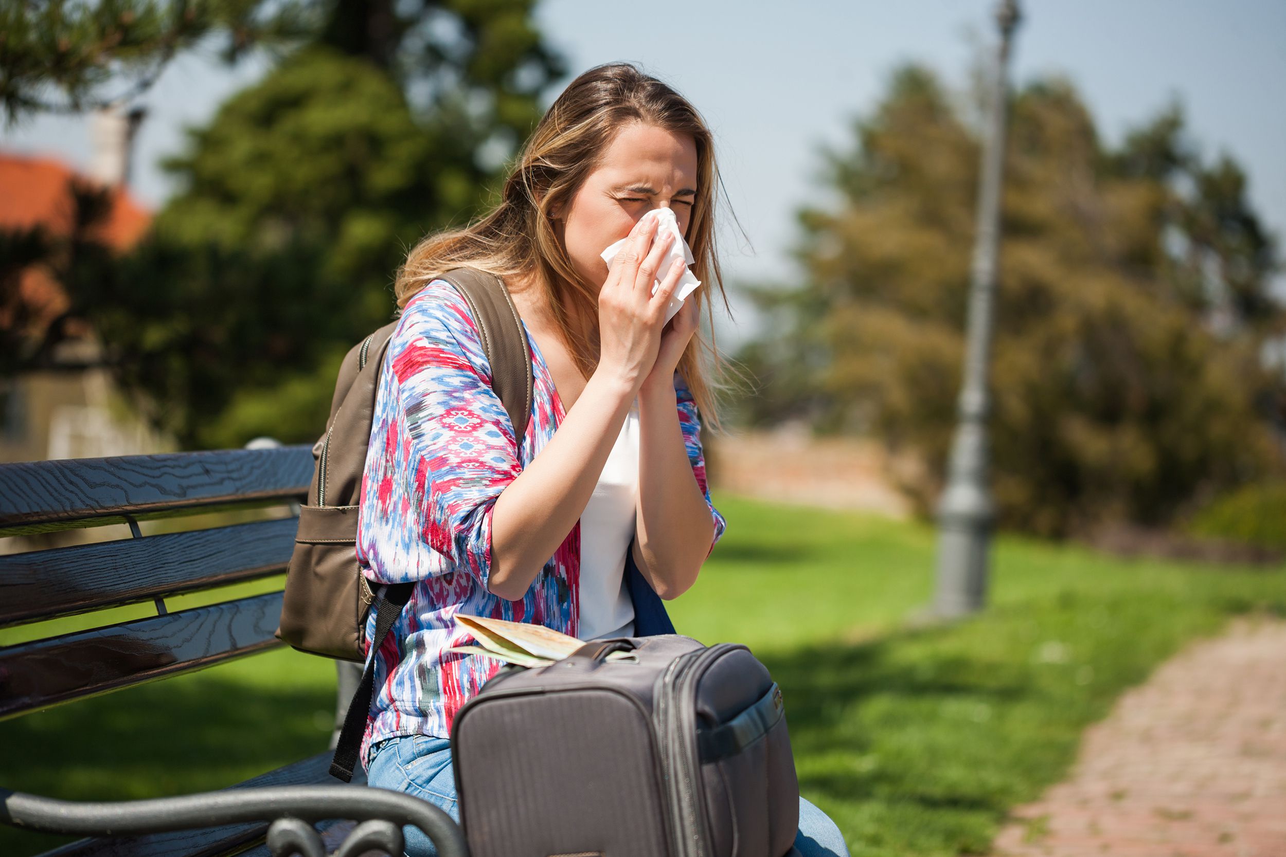 woman on vacation with the flu
