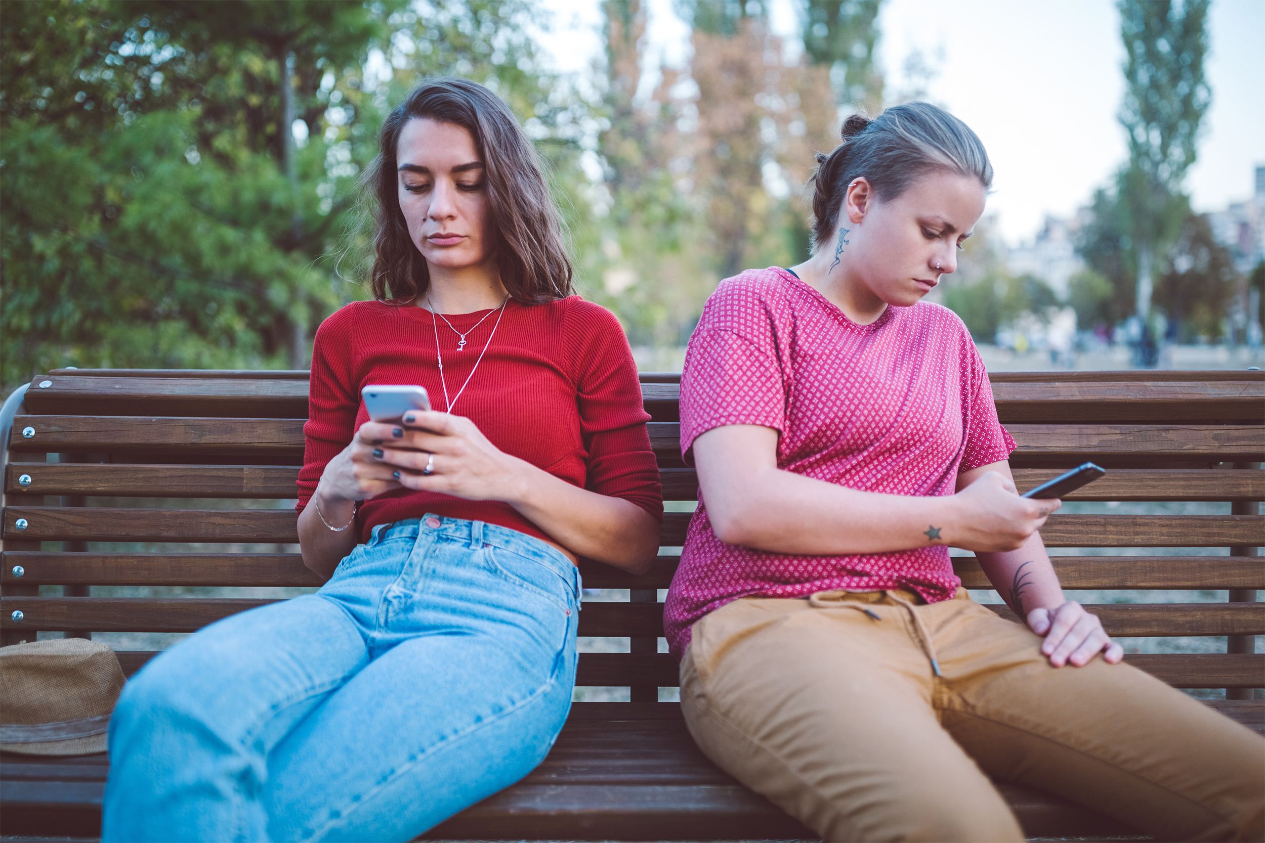 Couple texting and ignoring each other