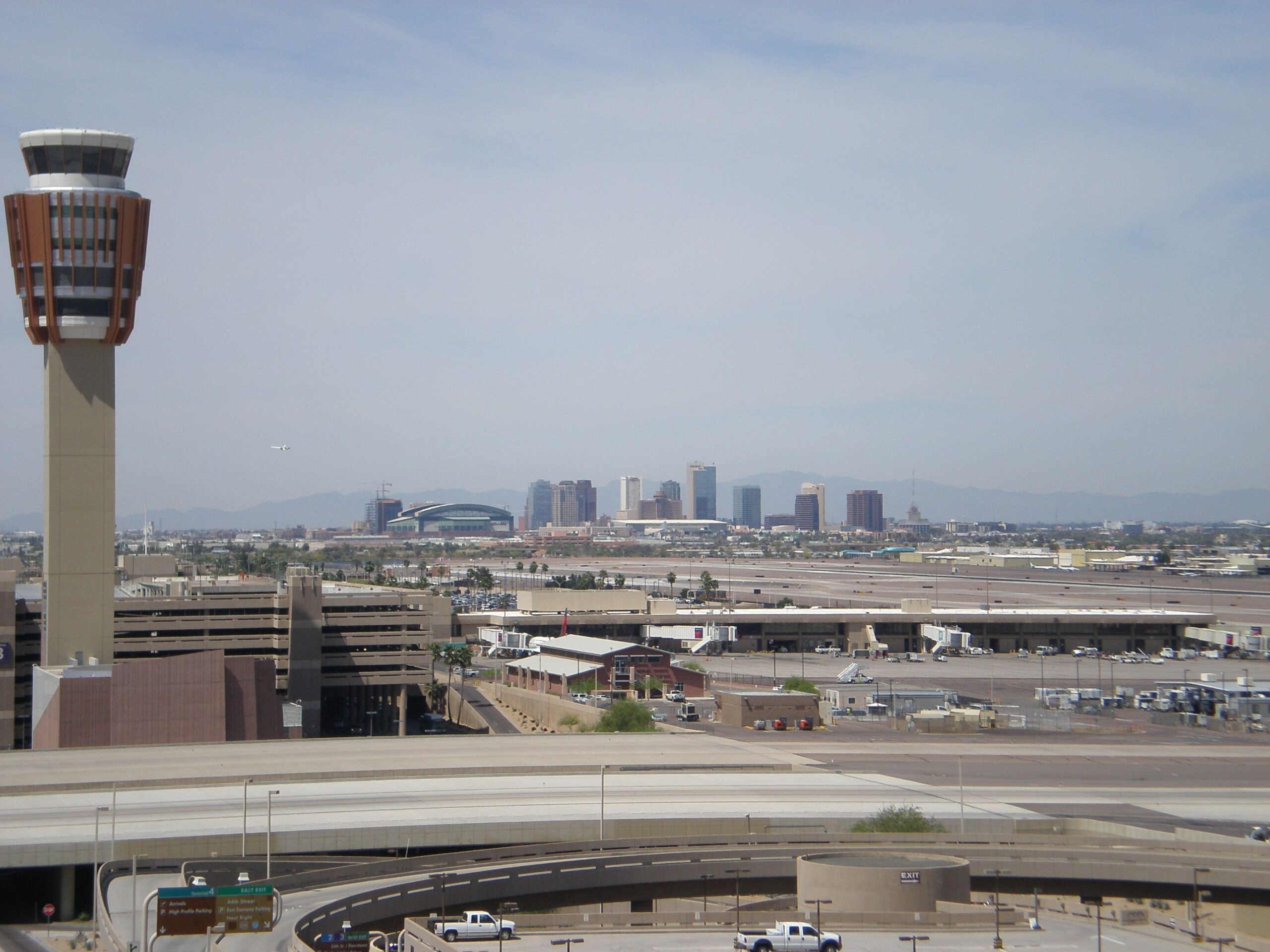 PHX Sky Harbor's control tower w/ downtown PHX in the background.