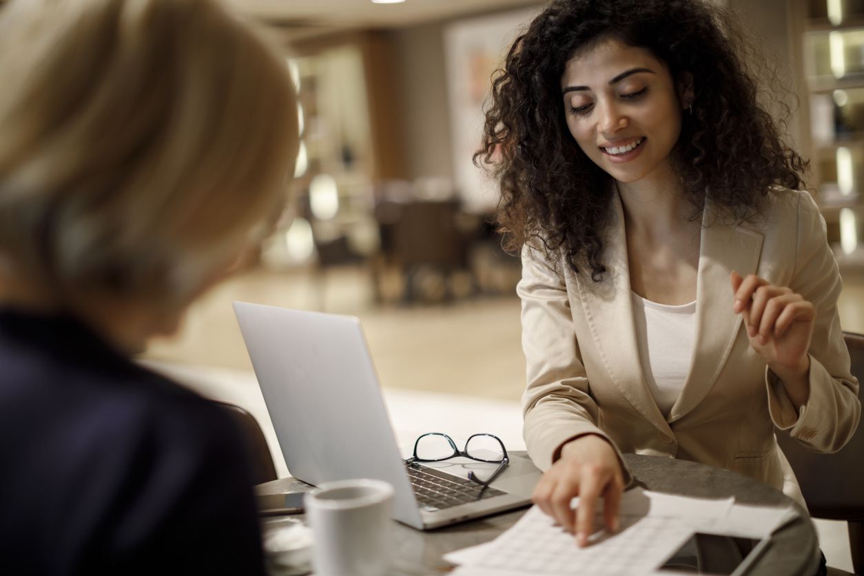 Woman explaining to client