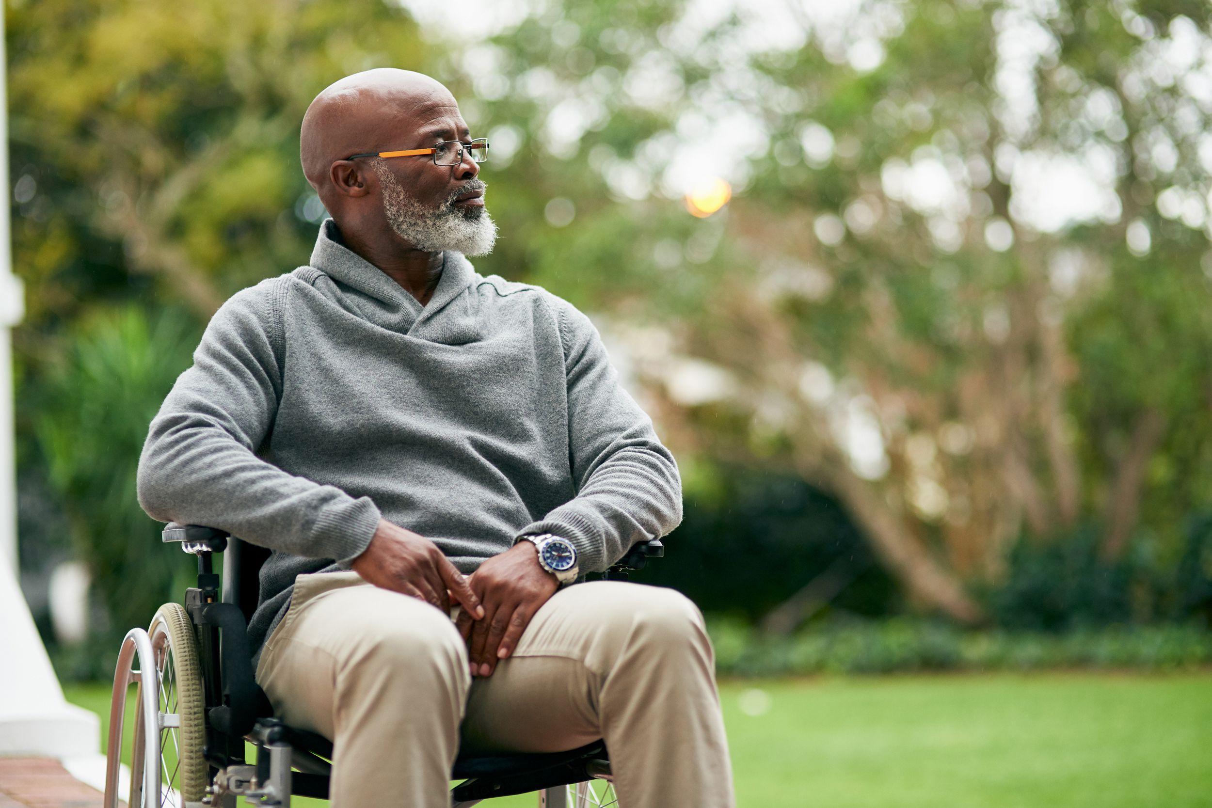 senior man in wheel chair outdoors