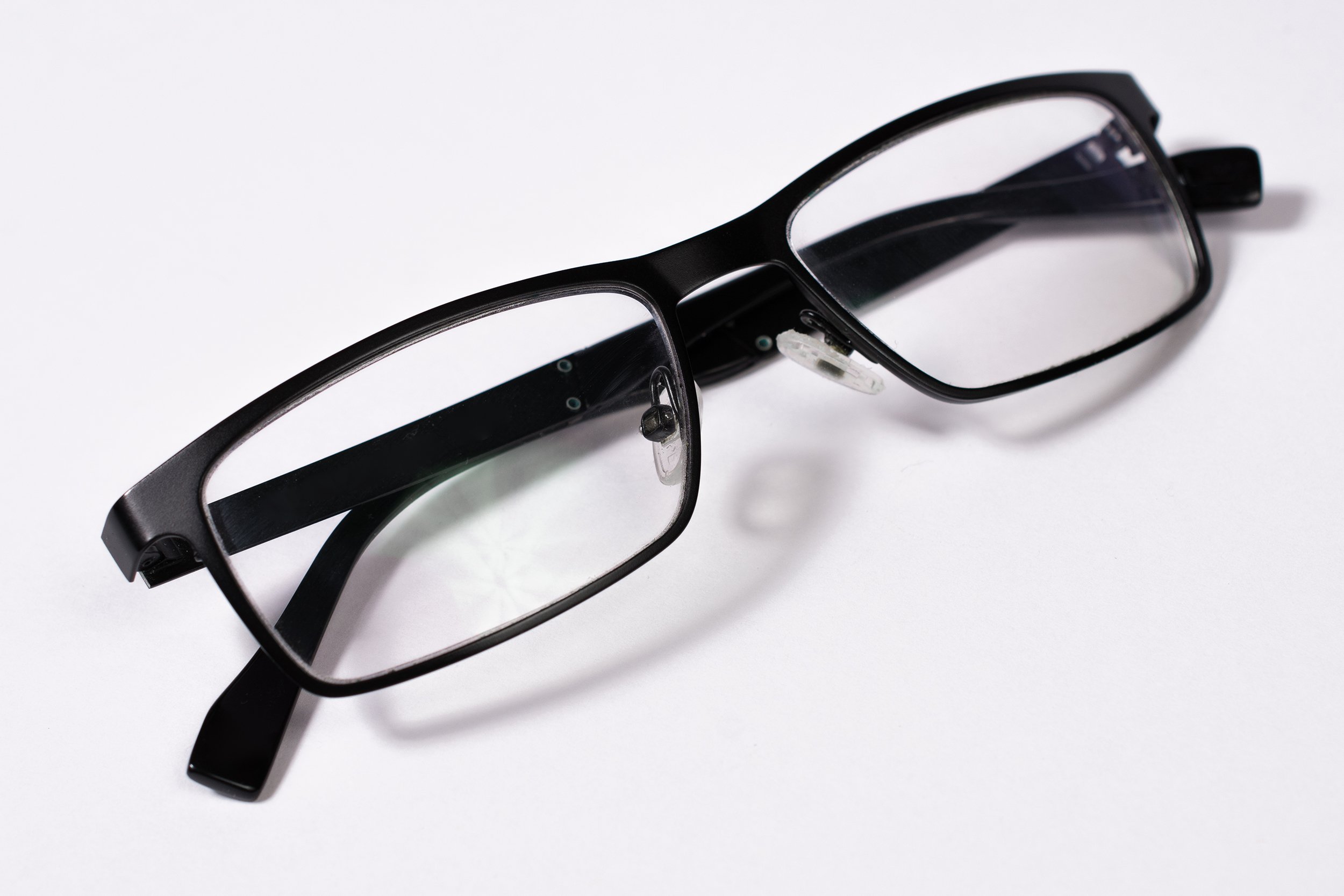 folded black eye glasses