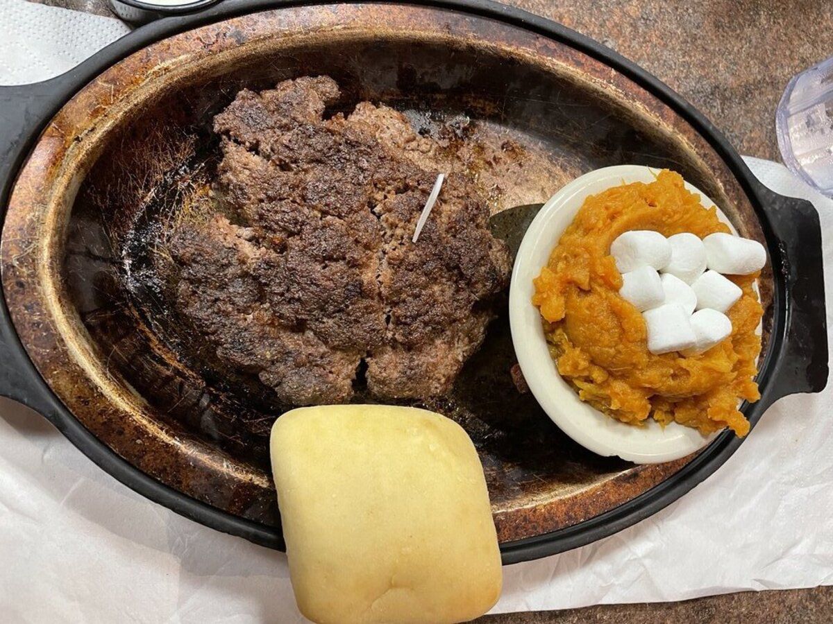 buffalo steak with sweet potatoes at Ole's Big Game Steakhouse & Lounge, Paxton, Nebraska