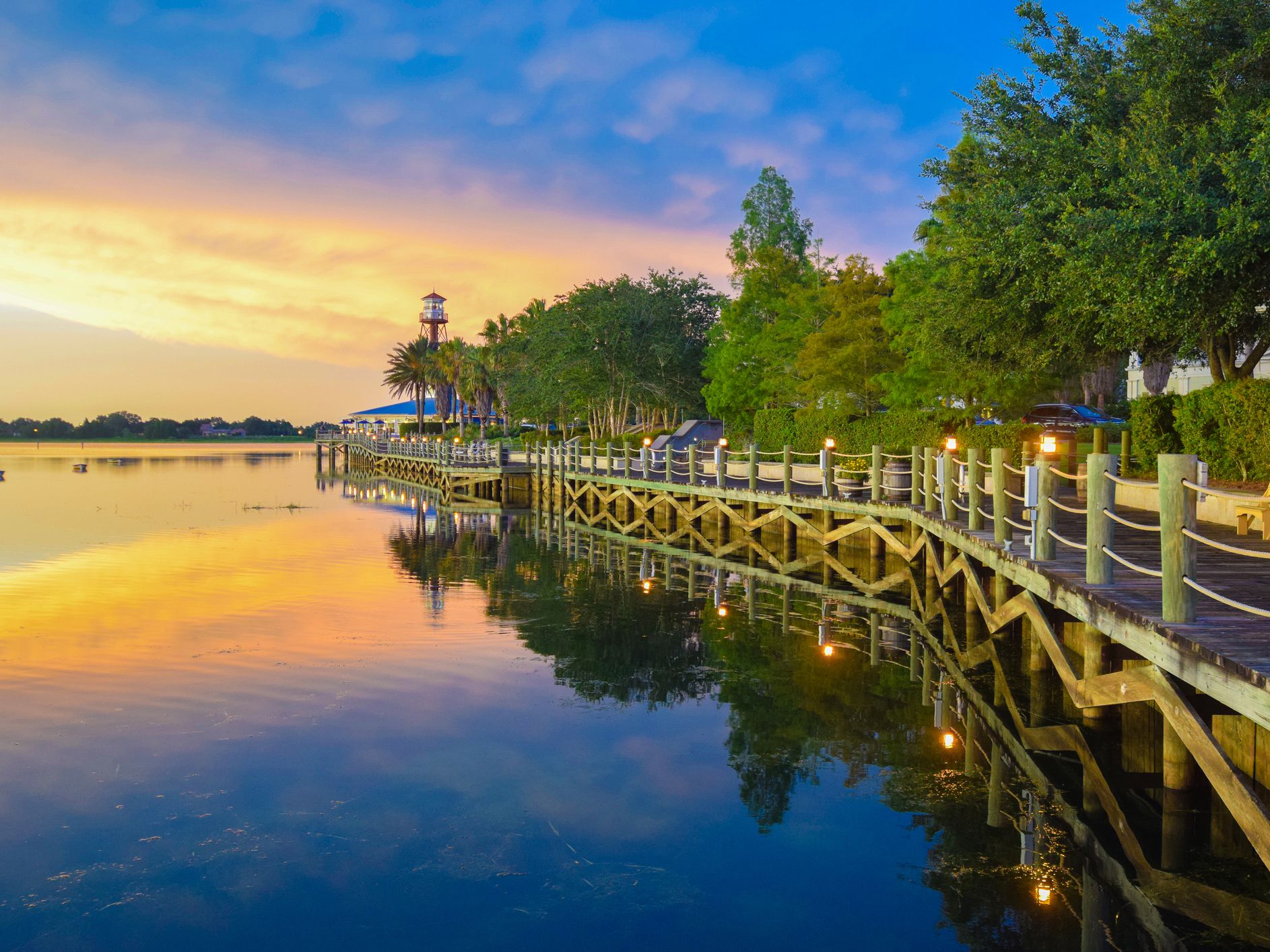 Sunset on the boardwalk on the waterfront at The Villages, Florida.